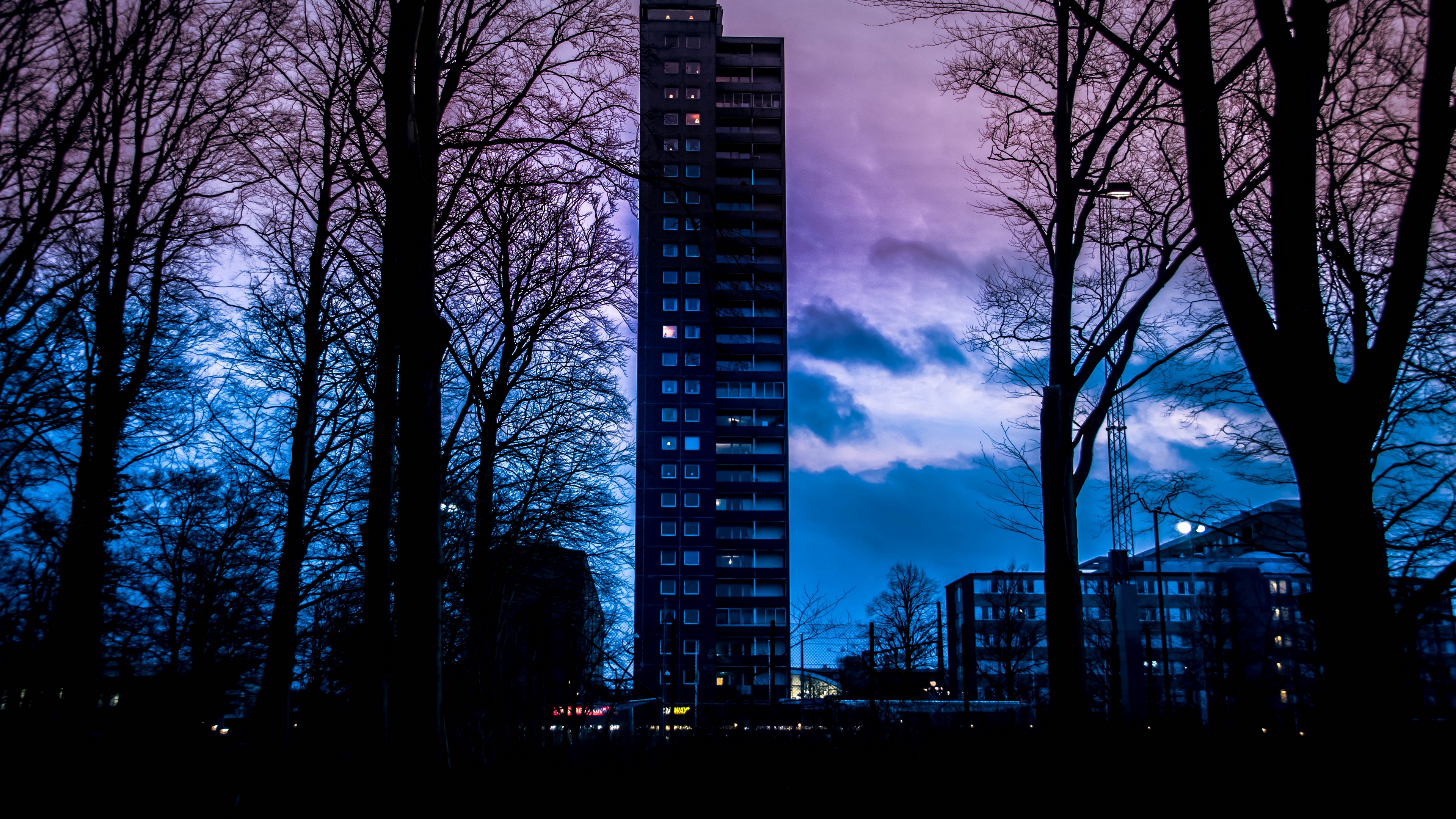 building sunset sweden clouds 4k 1538065526