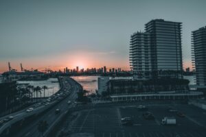 city bridge sea sunset 4k 1538067202