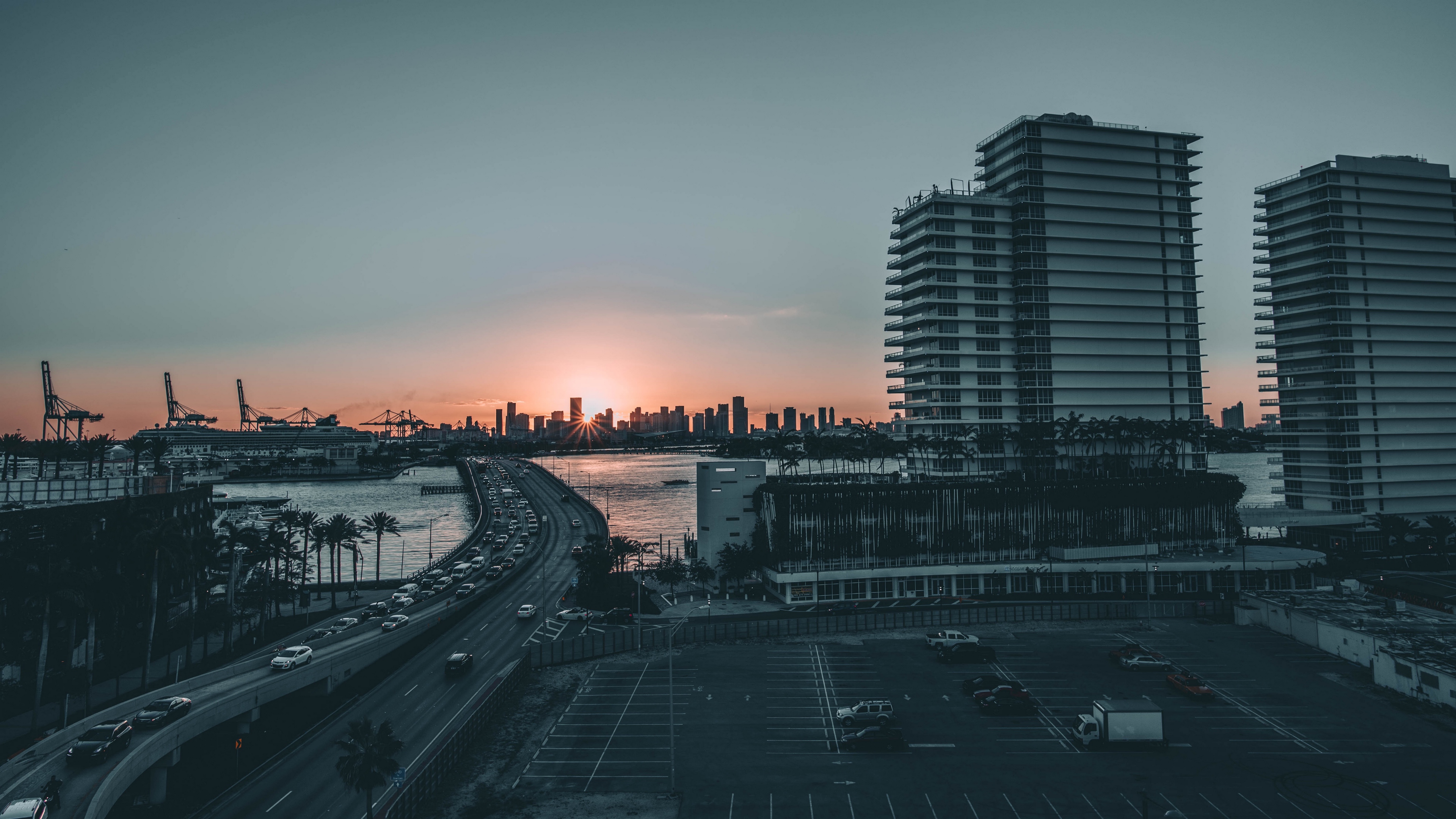 city bridge sea sunset 4k 1538067202