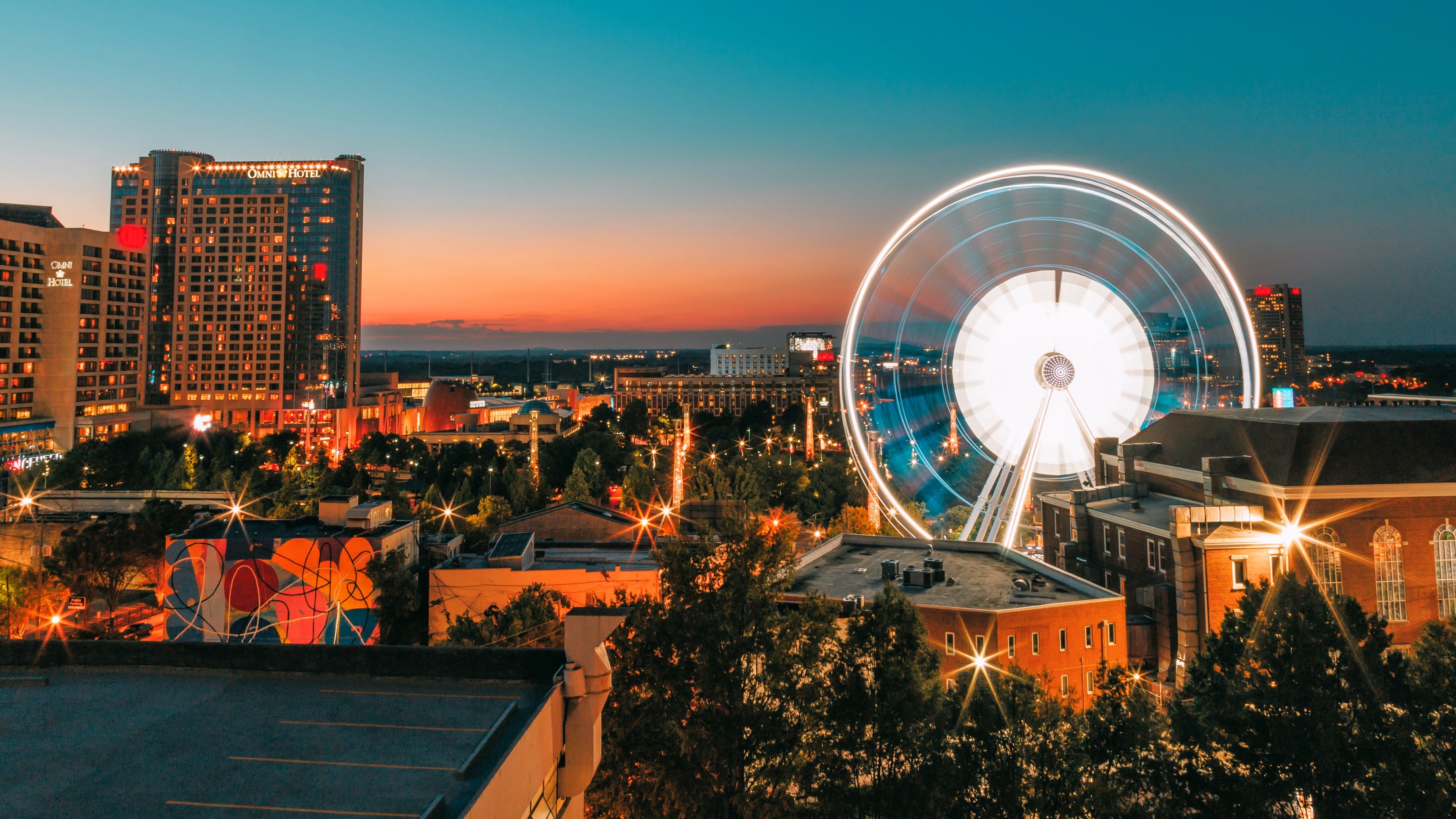 ferris wheel night city buildings 4k 1538066179