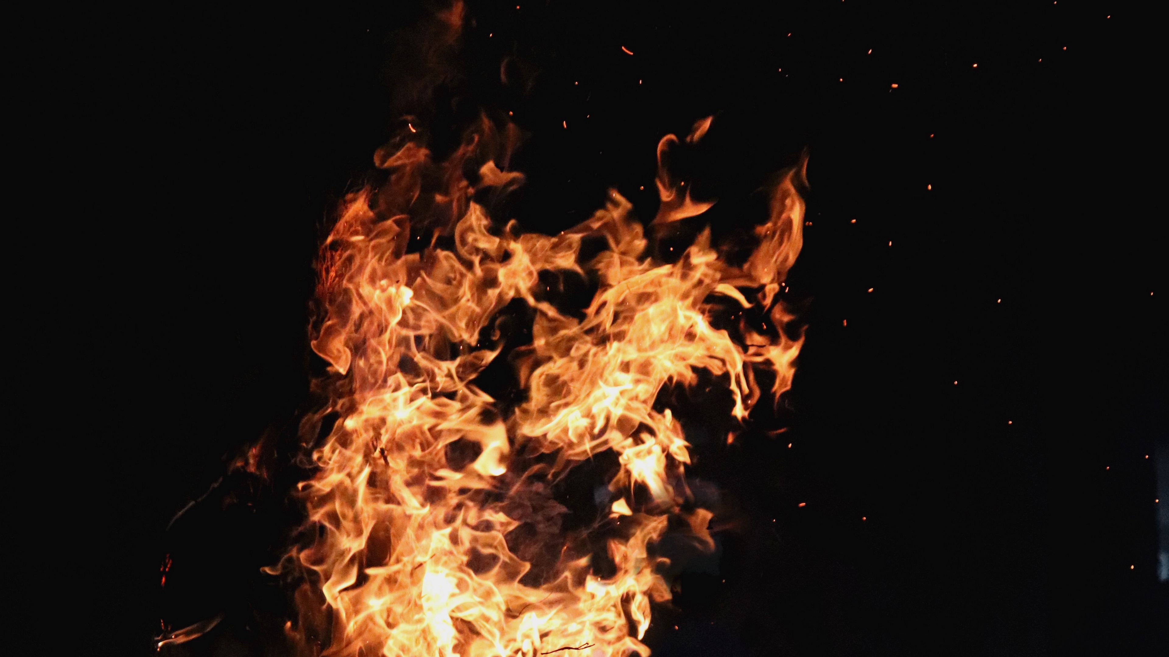 fire bonfire flame dark background 4k 1536017751