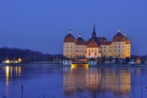 germany saxony moritzburg castle evening lights light water reflection 4k 1538067623