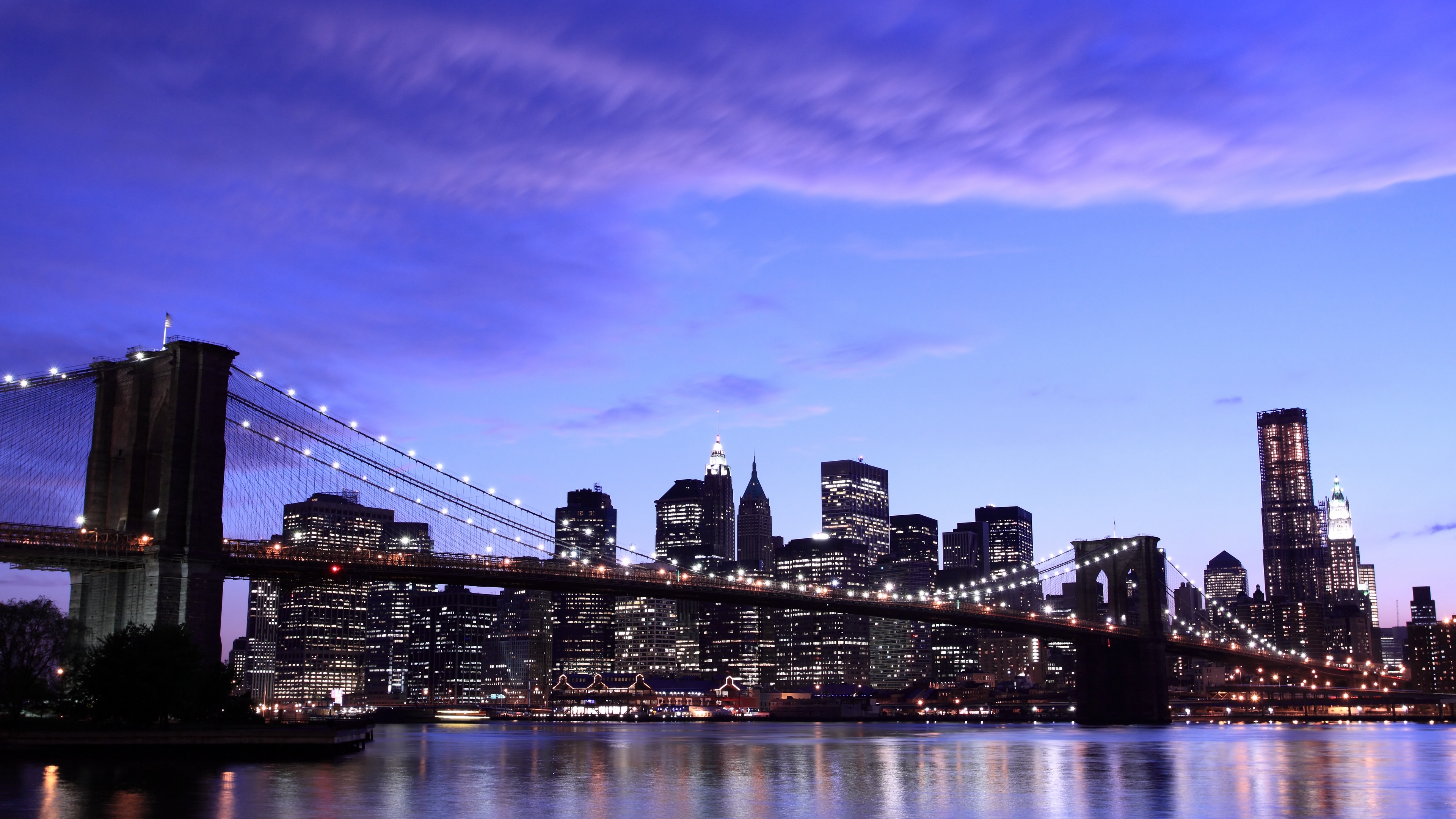 new york city brooklyn bridge evening lights sky clouds 4k 1538066367