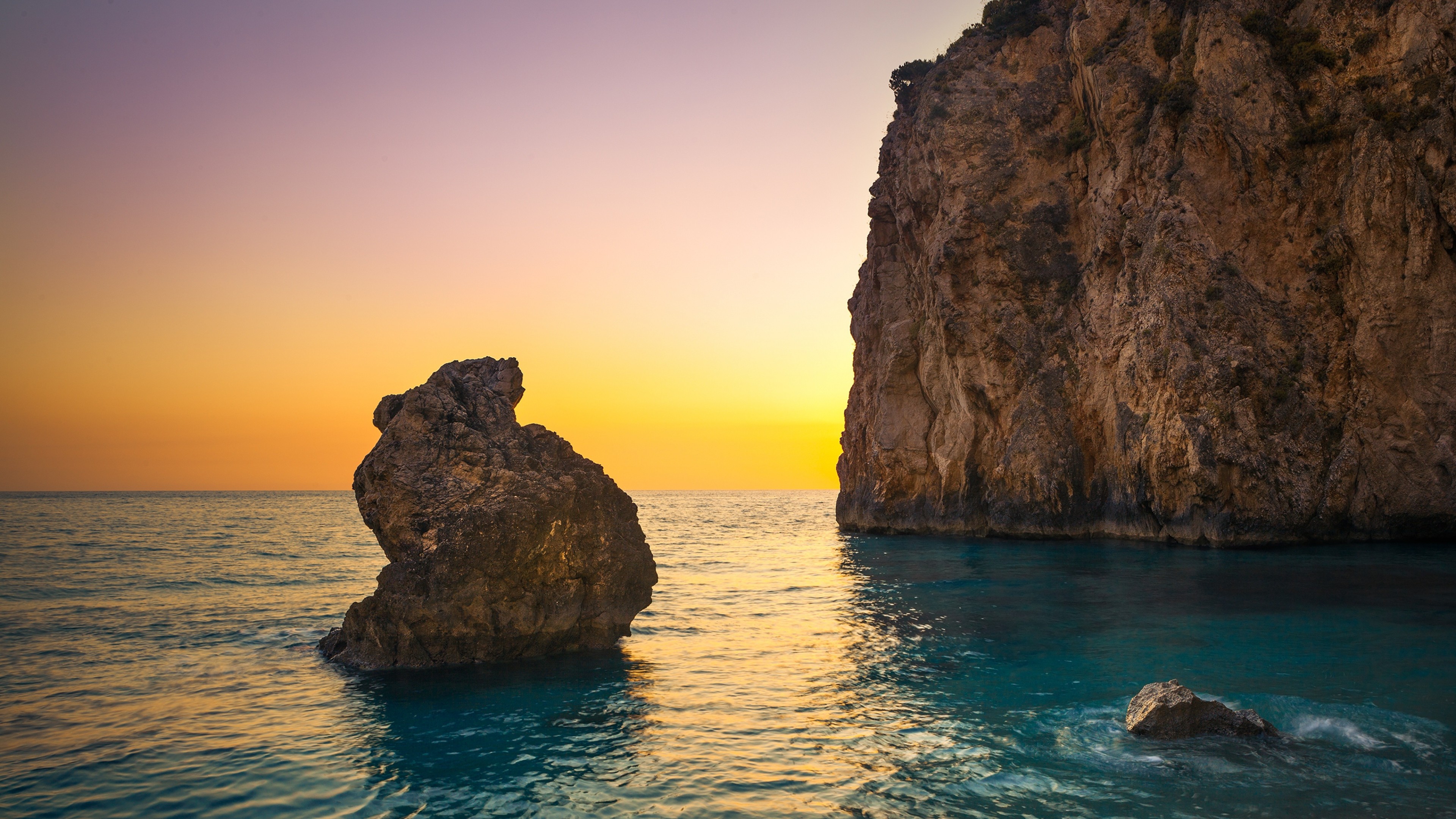 sea boulders sky sunrise 1535923983