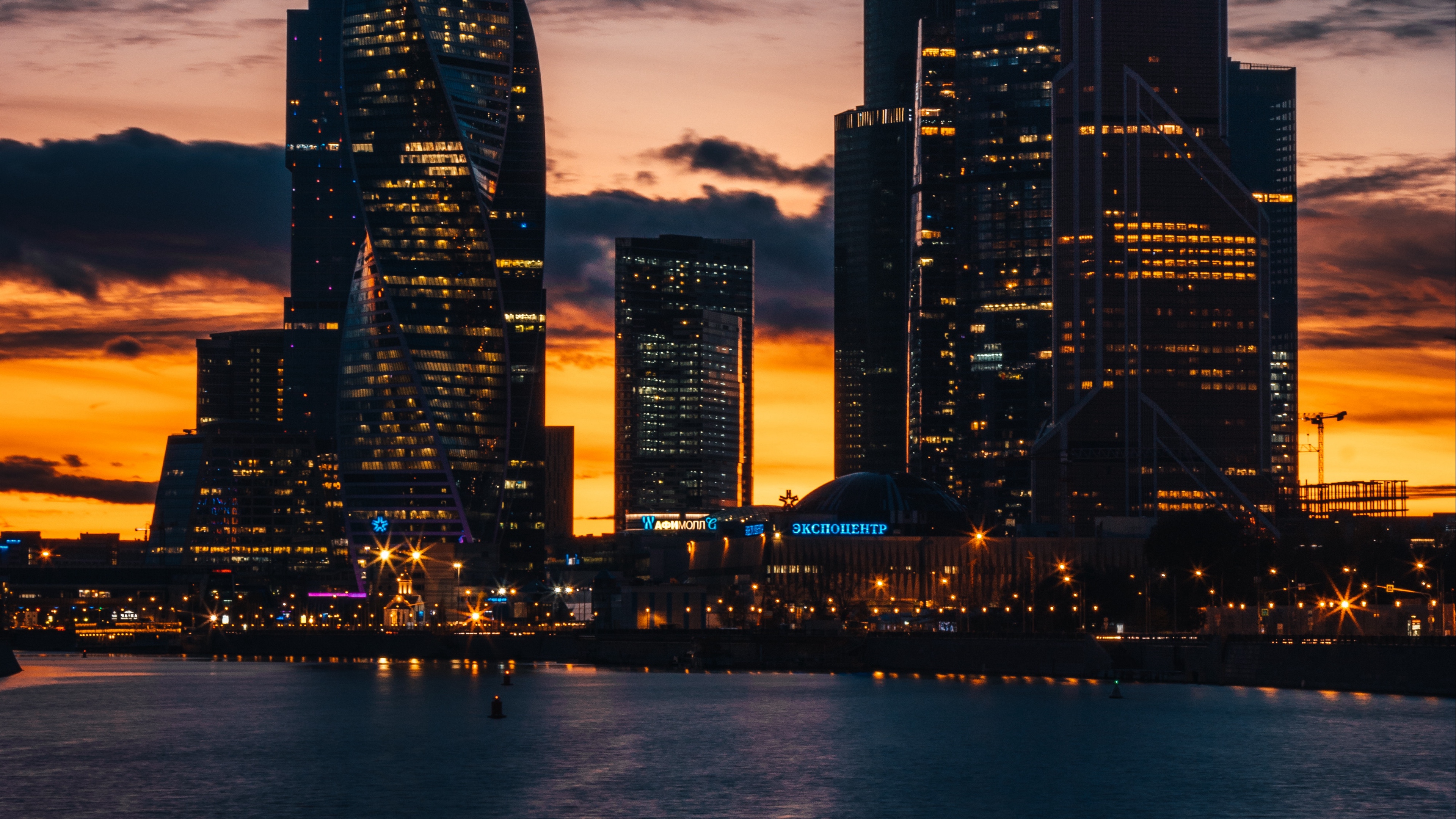 skyscrapers night city sunset buildings 4k 1538066309