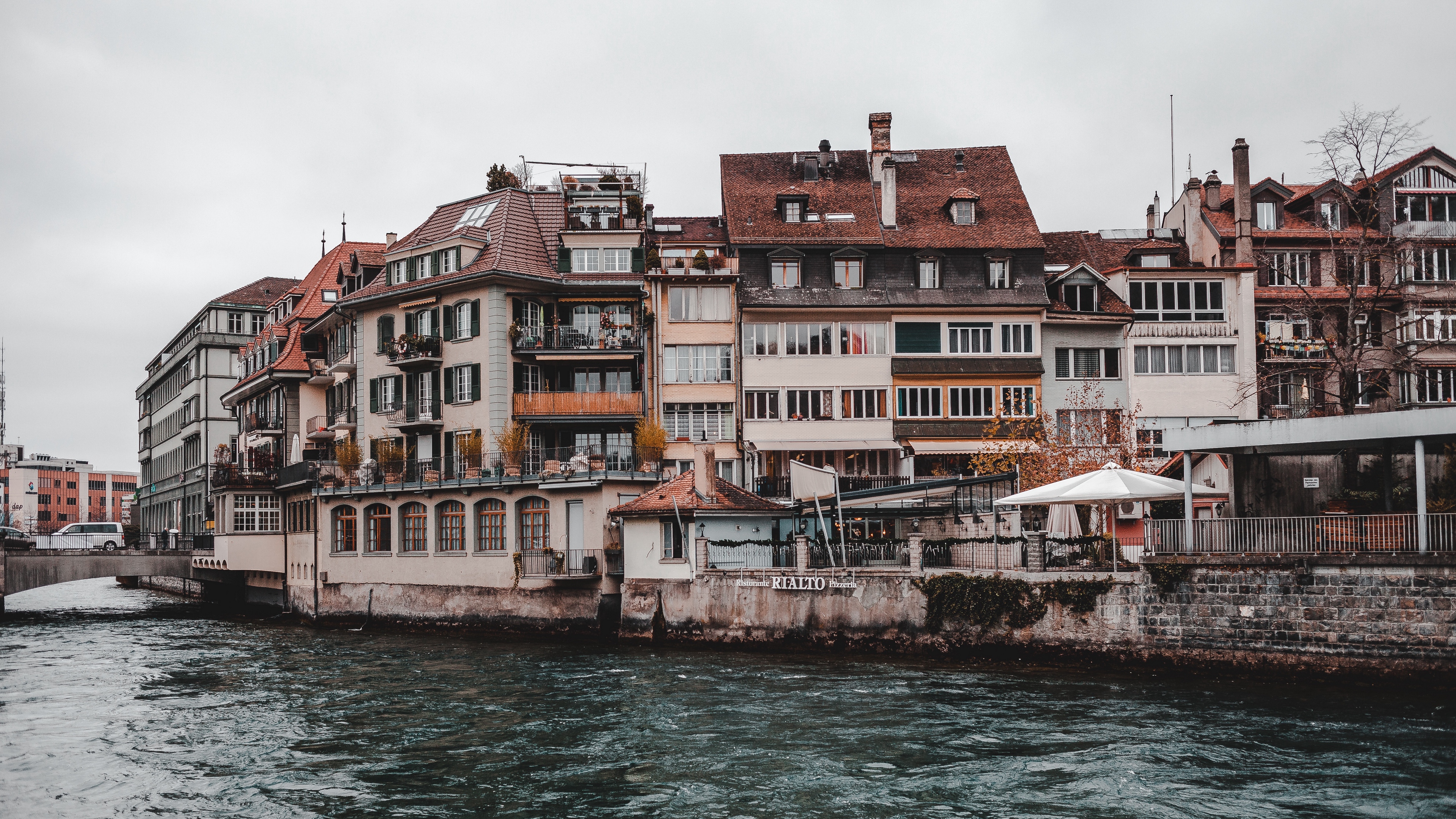 thun switzerland building river shore 4k 1538067111