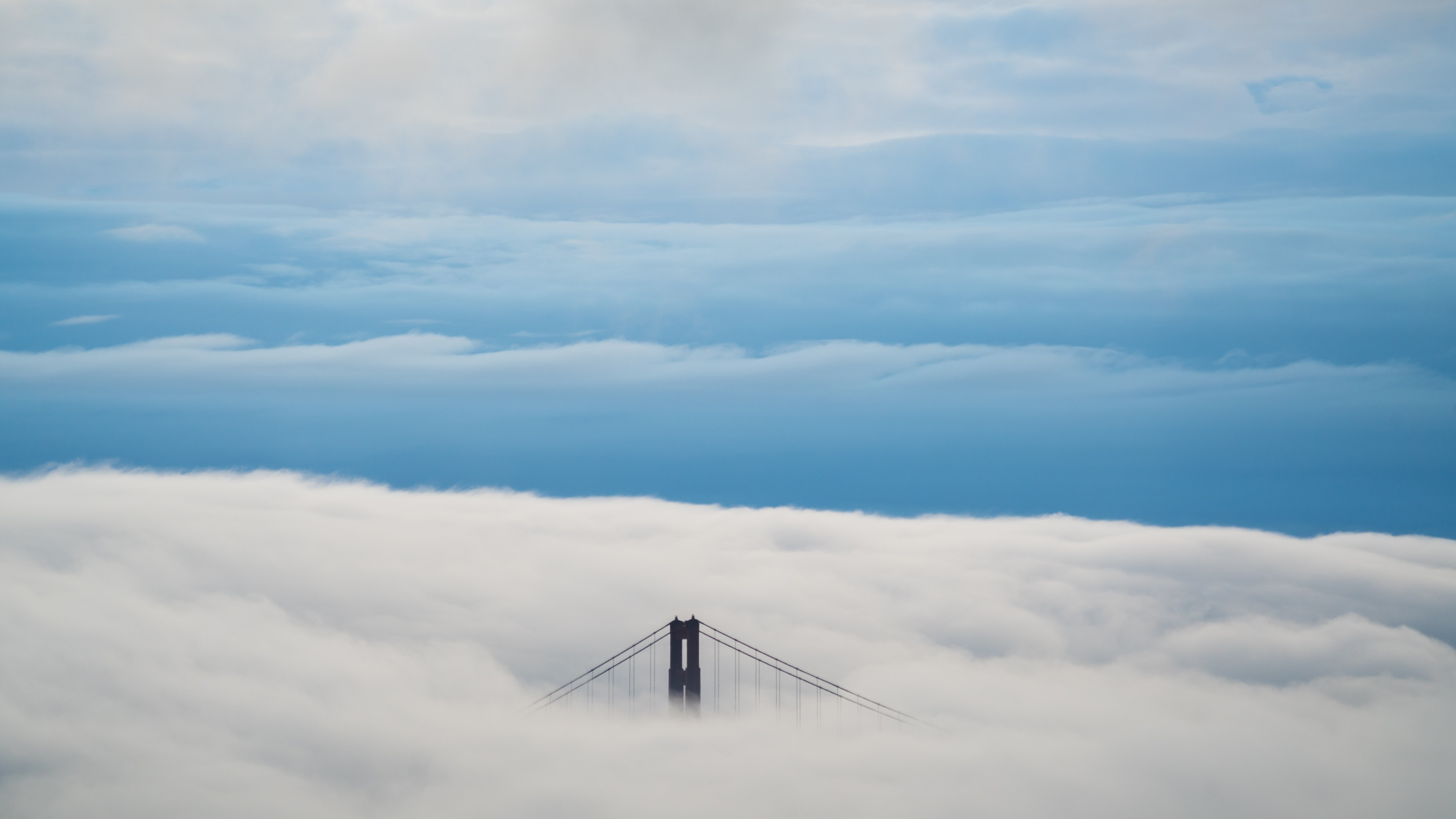 aerial view of bridge under clouds 8k 1540143442