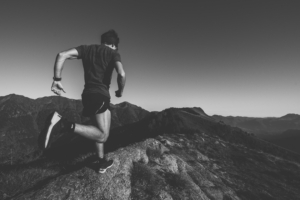 athlete running mountains bw 4k 1540062198