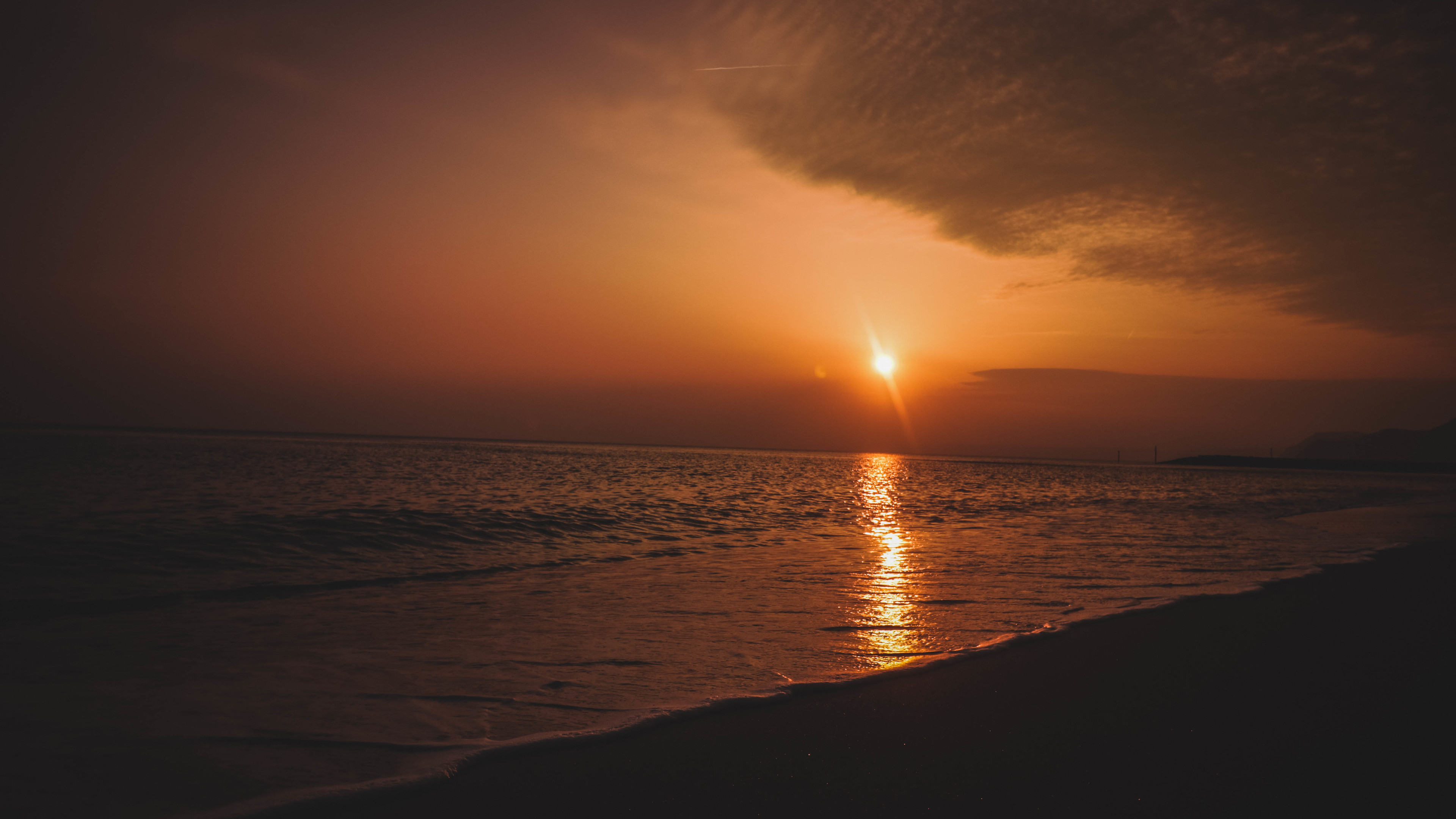 beach shore during sunset 4k 1540135437