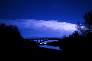 bridge night starry sky clouds 4k 1540574683