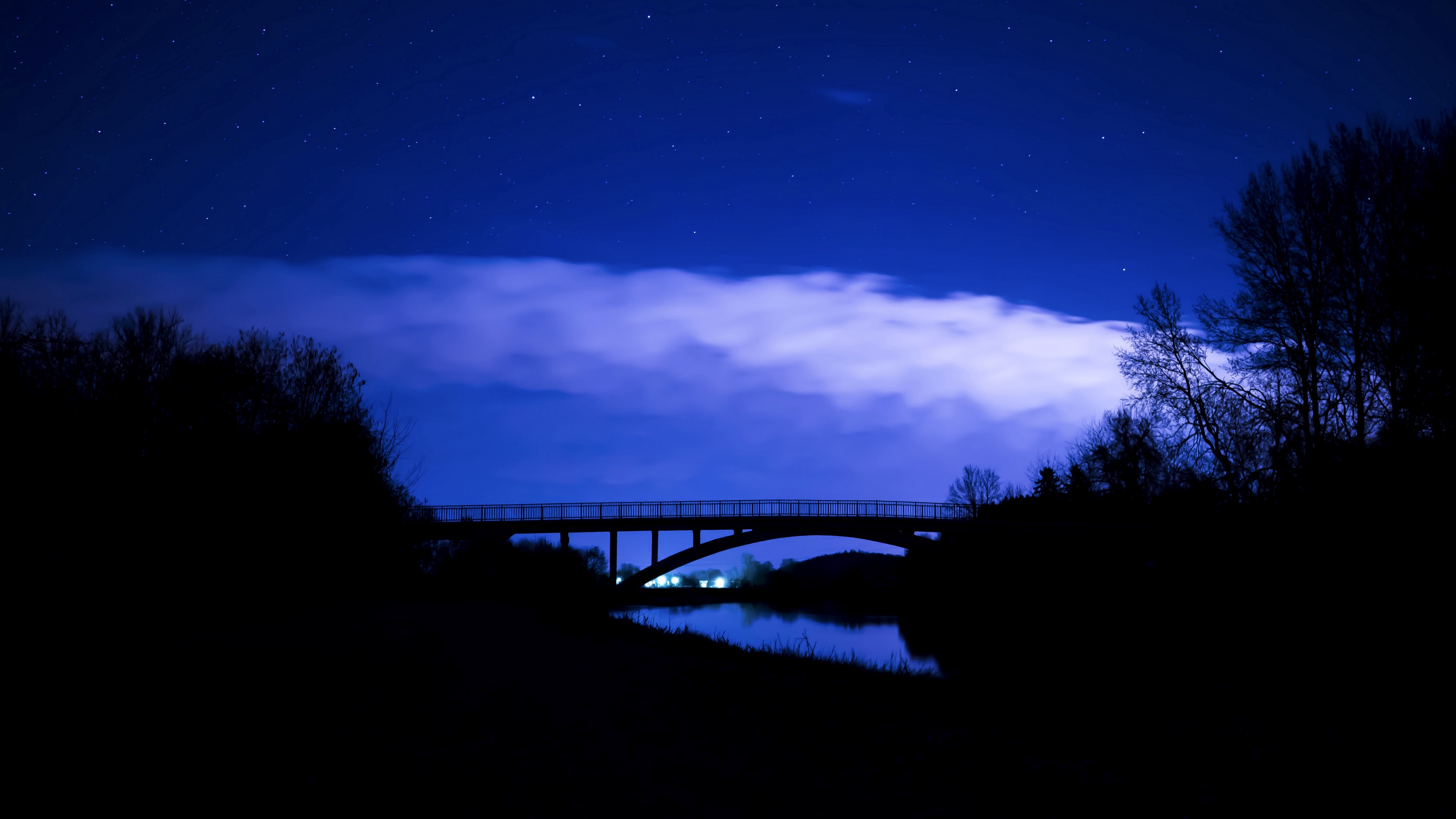 bridge night starry sky clouds 4k 1540574683