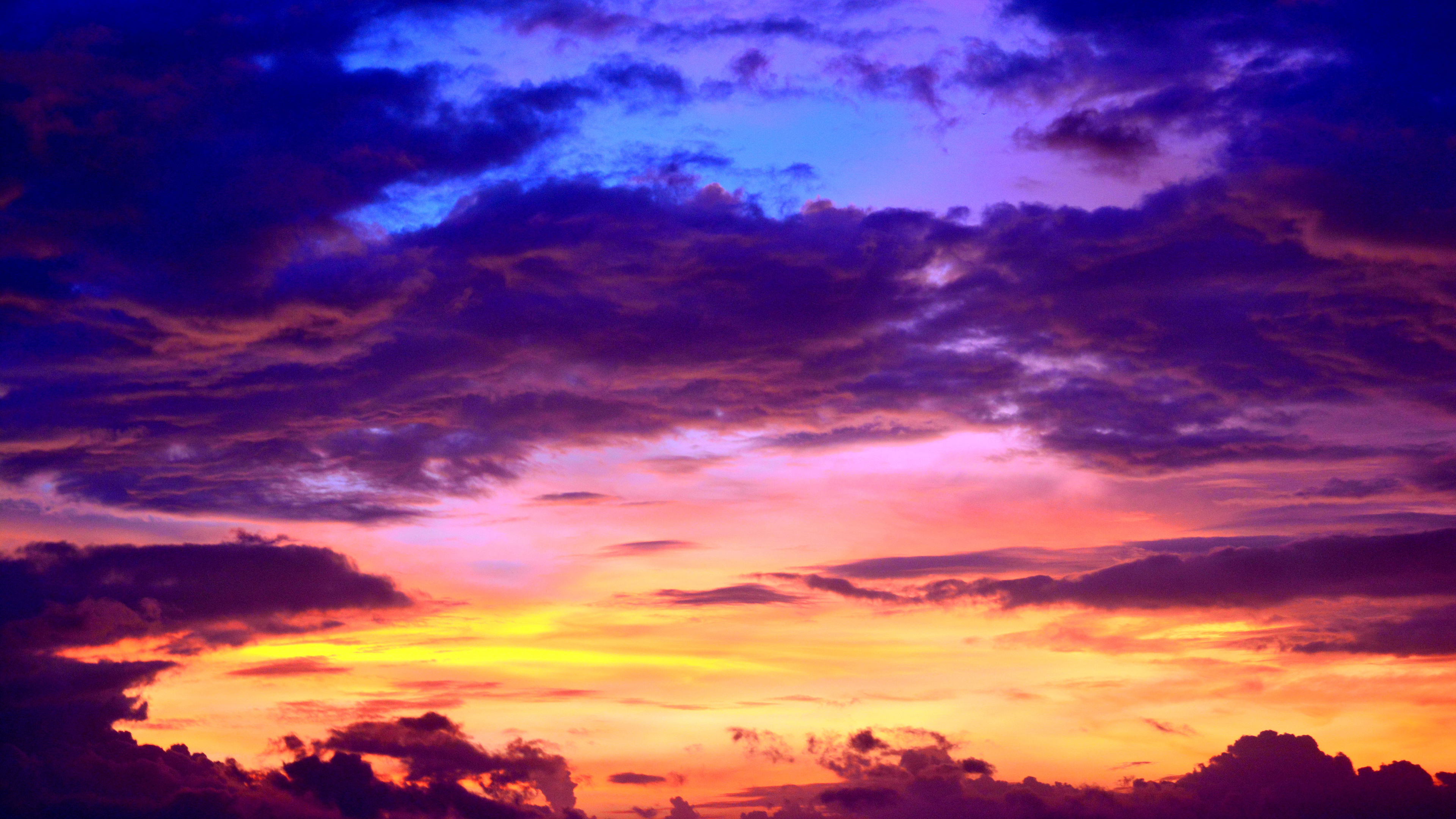 cumulus clouds evening silhouette 1540136555