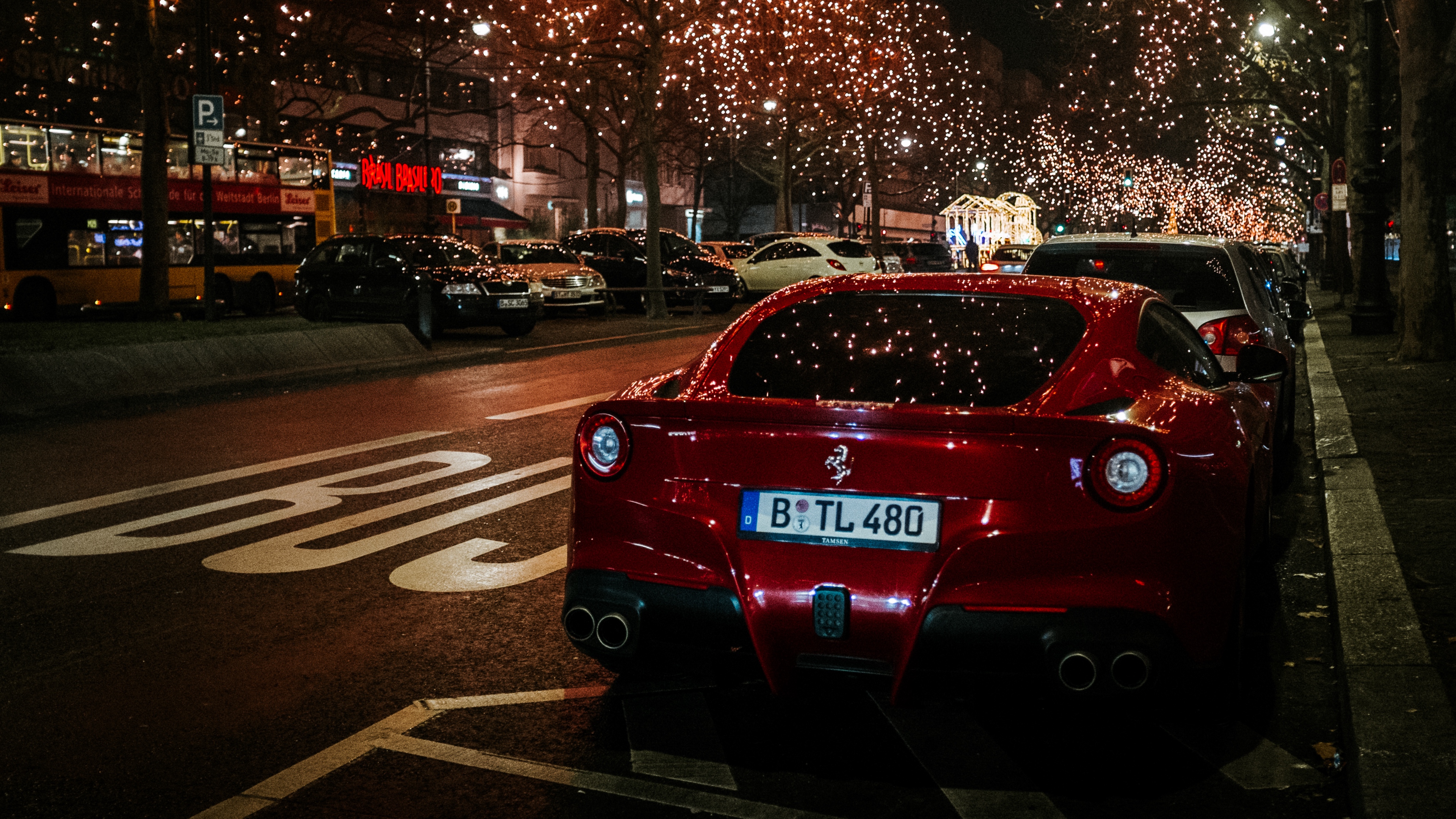 ferrari rear view red night city scenery 4k 1538935278