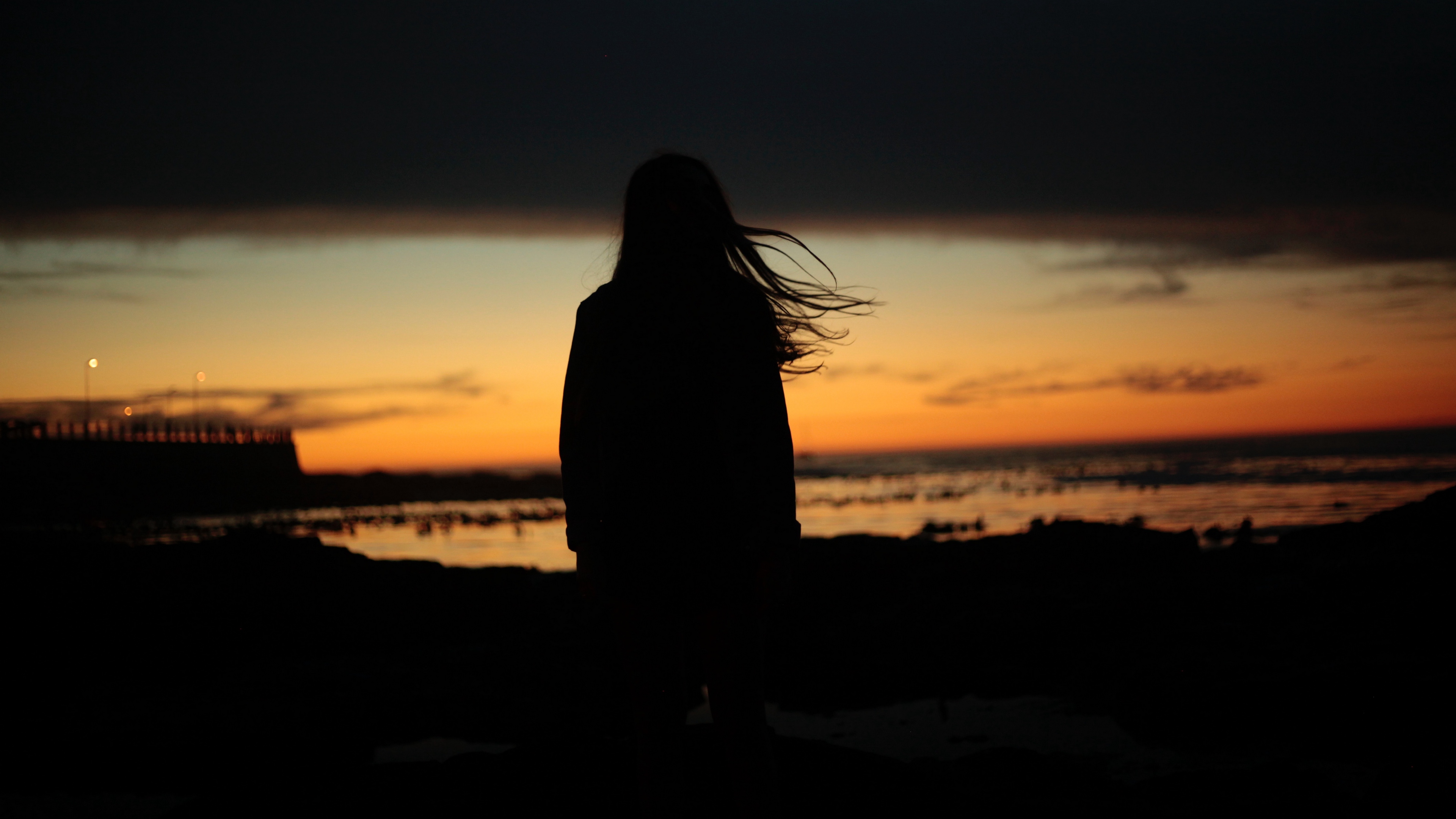 girl silhouette night hair wind 4k 1540575205