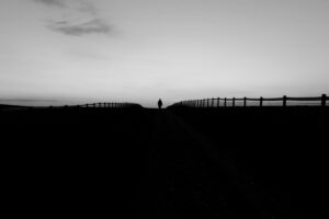 man silhouette fence bw 4k 1540574906