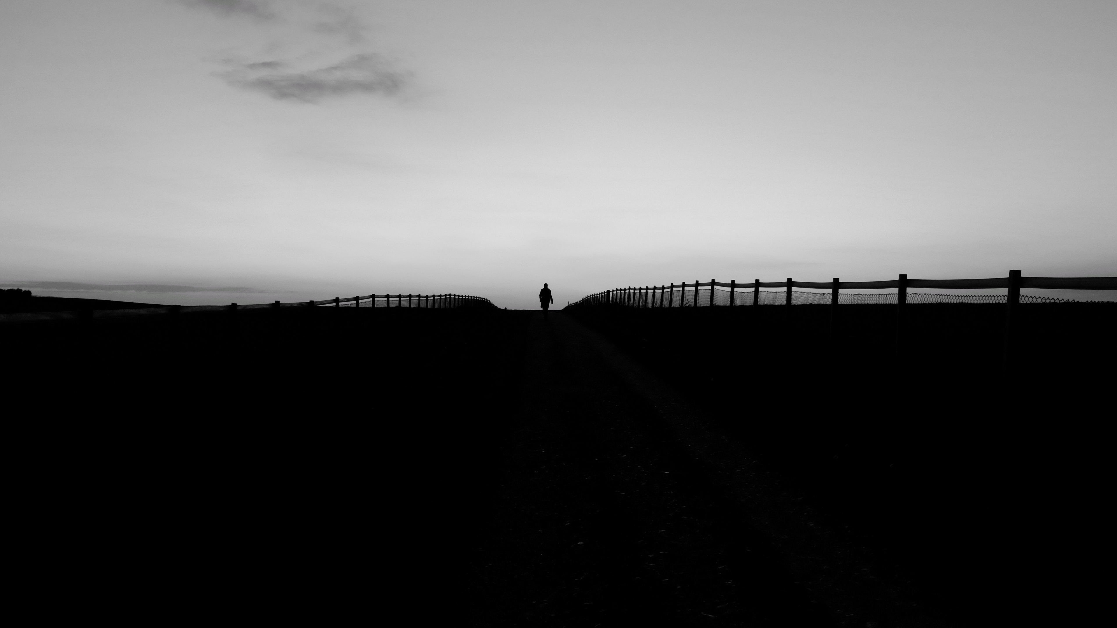 man silhouette fence bw 4k 1540574906