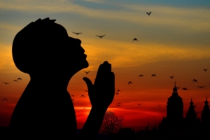 man silhouette prayer sky 4k 1540574886