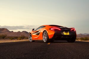 mclaren 570s rear view orange 4k 1538935523