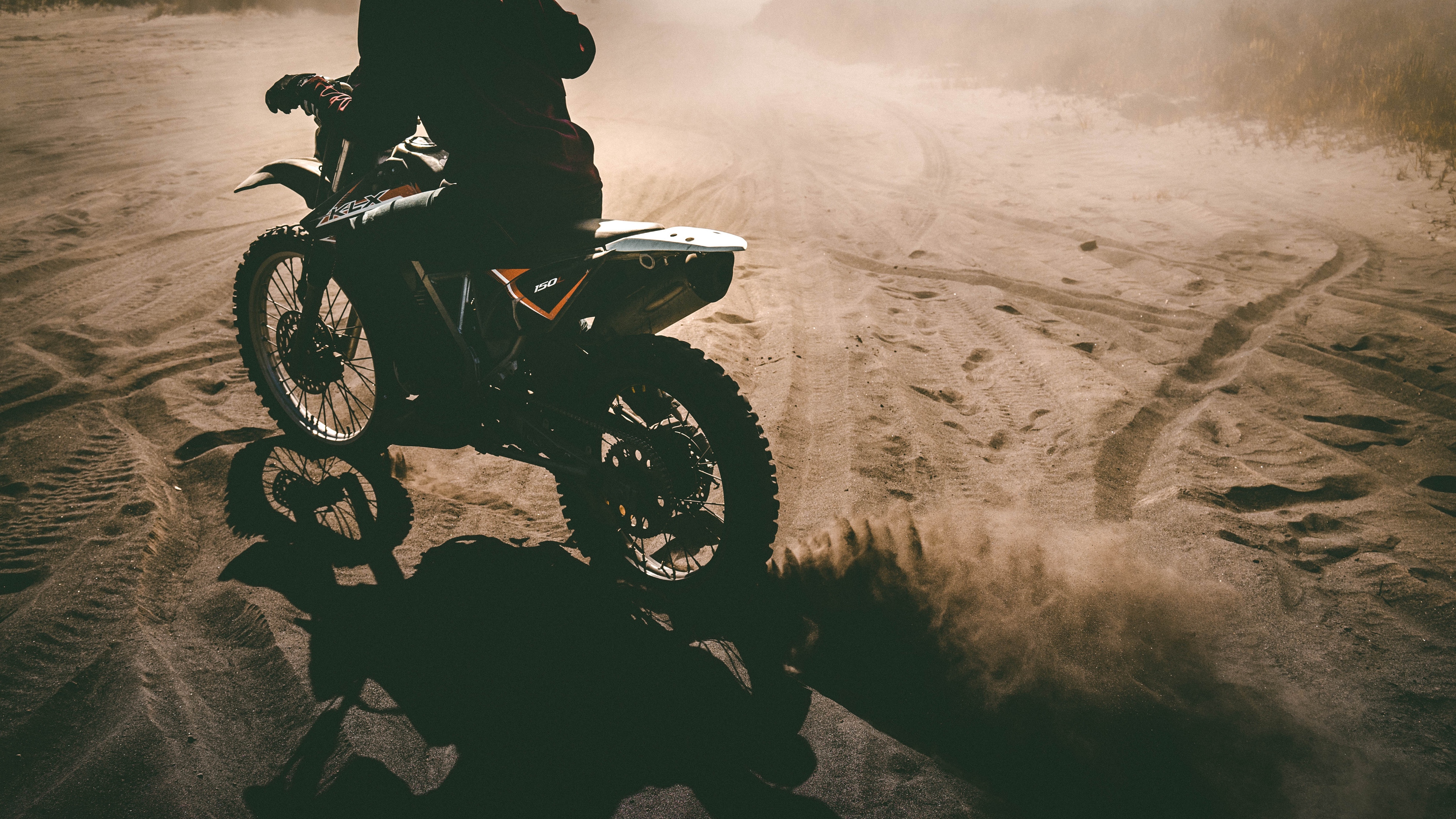 motorcyclist motorcycle sand 4k 1538943765