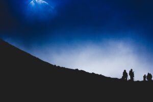 mountain silhouette night tourists mountaineers 4k 1540575047