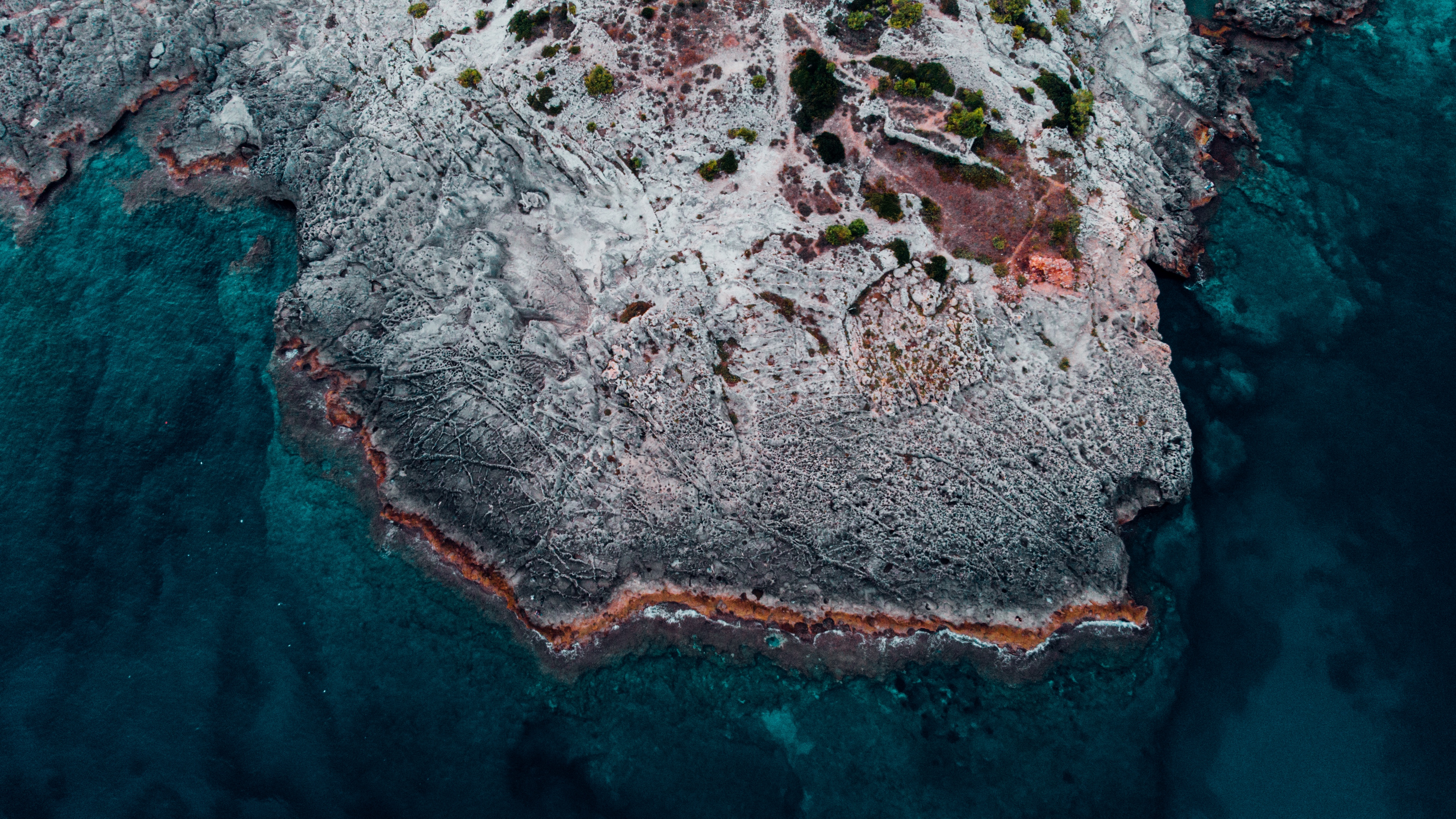 ocean shore aerial view water stones 4k 1540146088