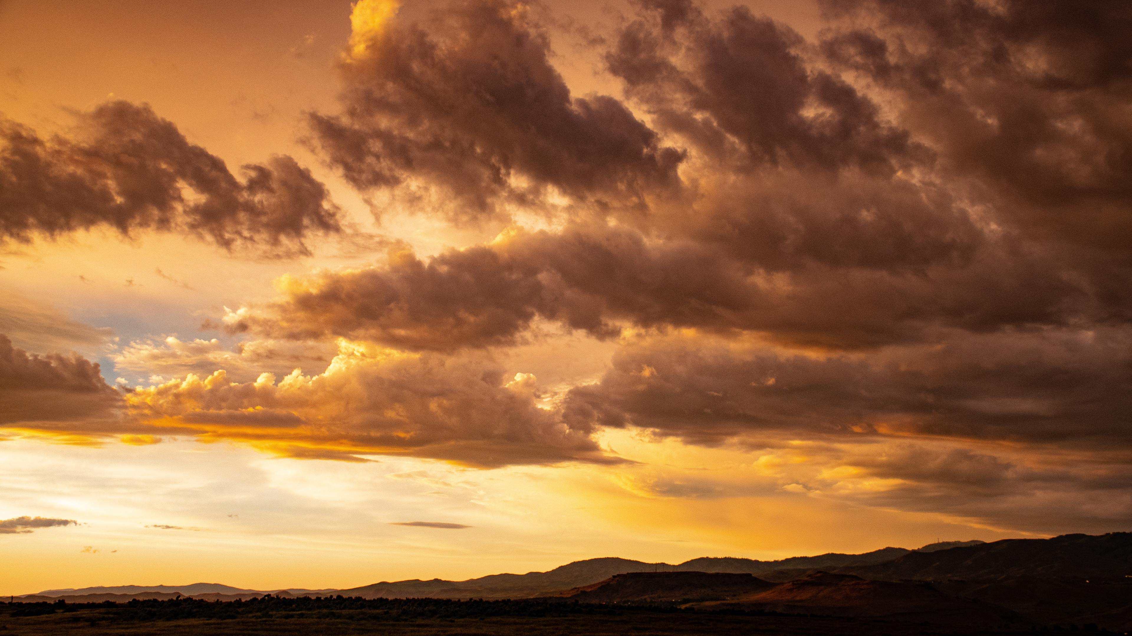 orange sunset clouds in sky 5k 1540141548