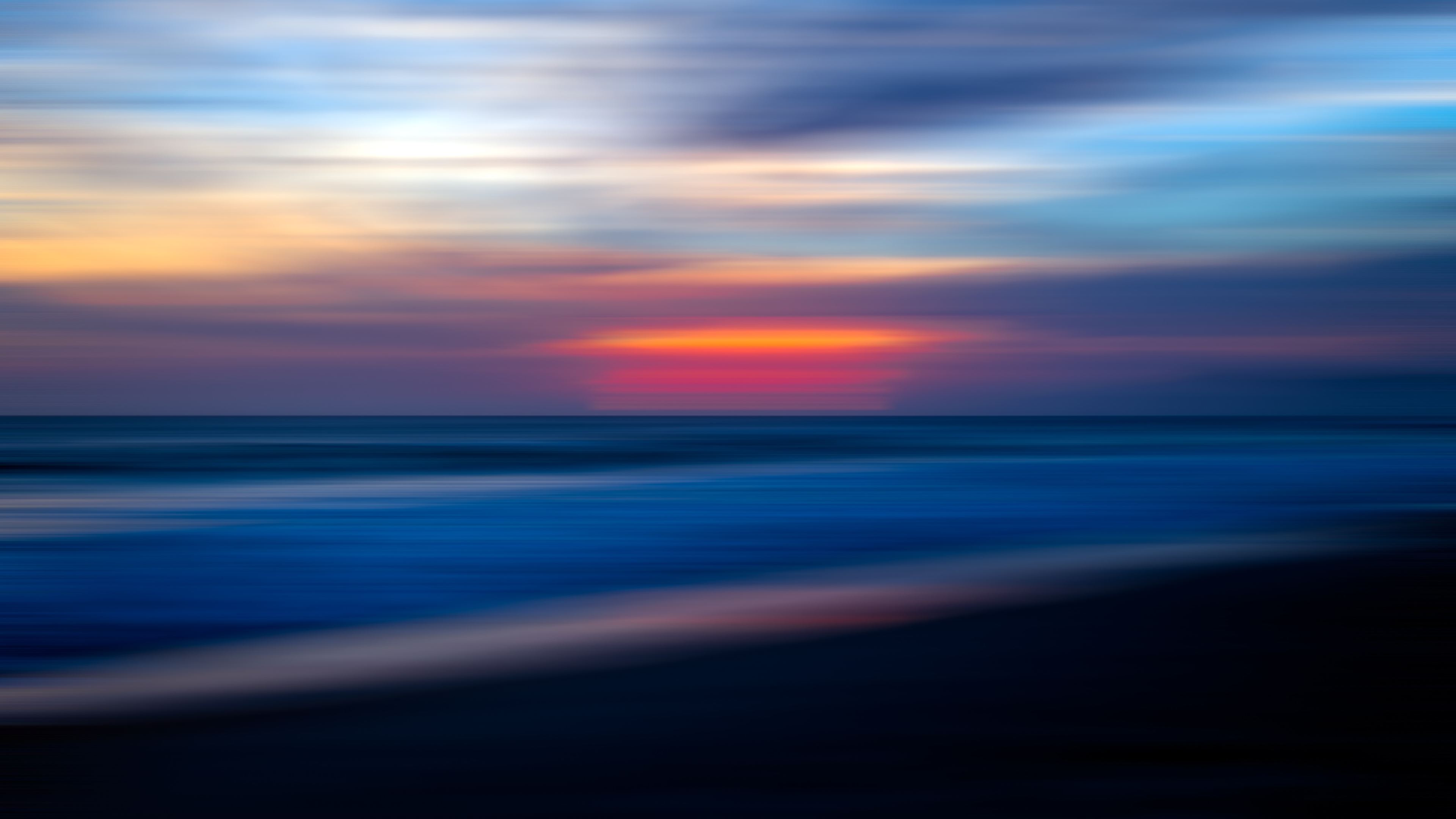 sea ocean water sunset blur 5k 1540144443