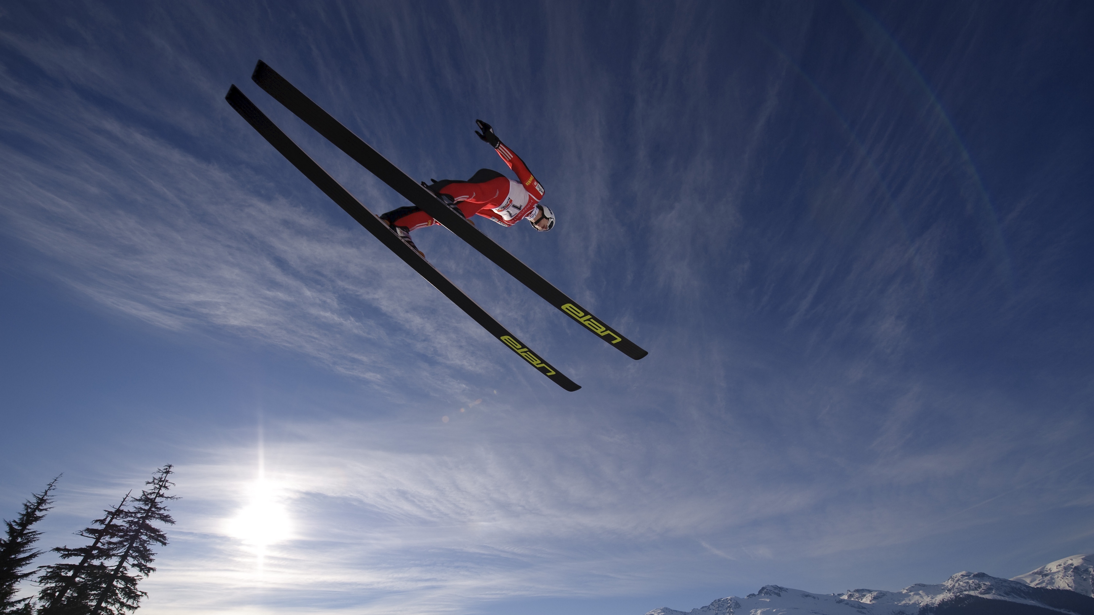 skier ski jump fly sky sun mountains 4k 1540061879