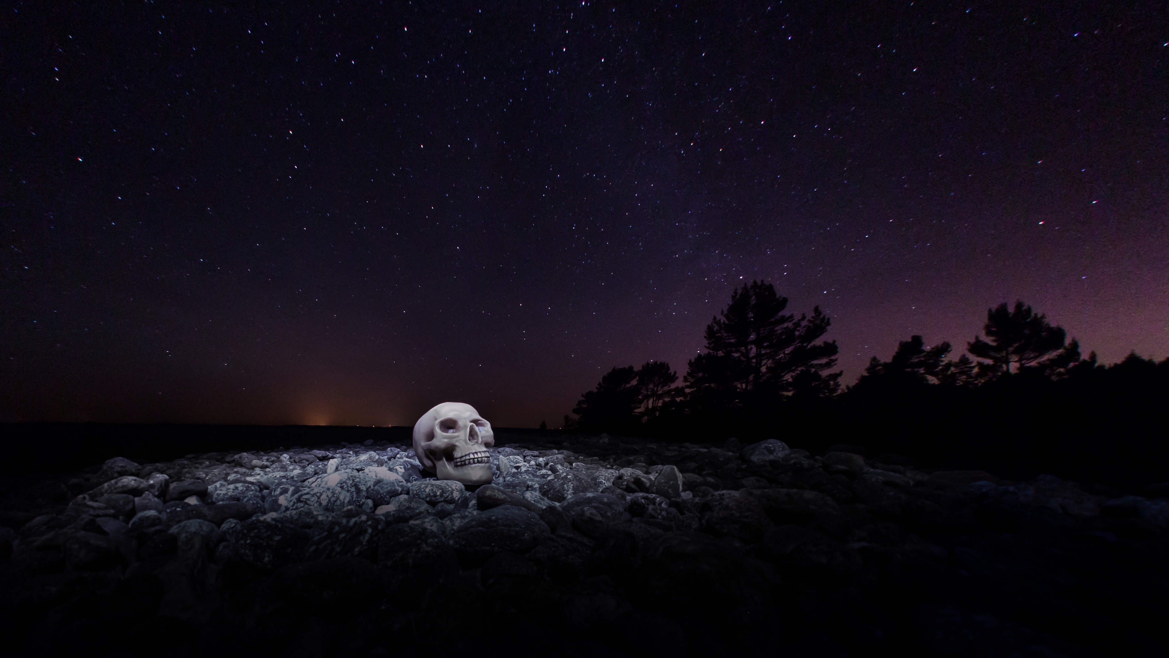 skull starry sky stones night 4k 1540574979