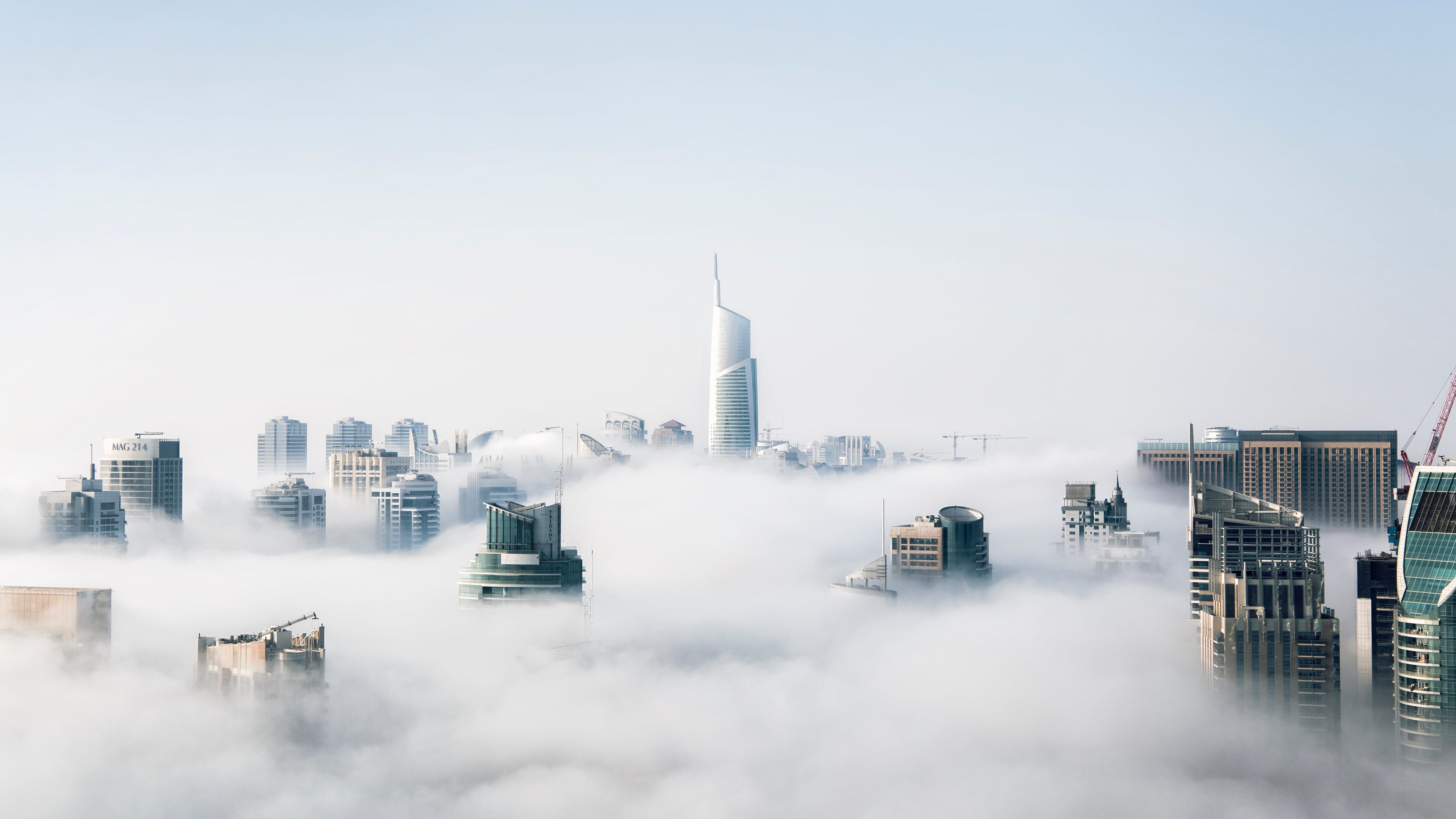 skyscraper buildings covered in fog 1540143654