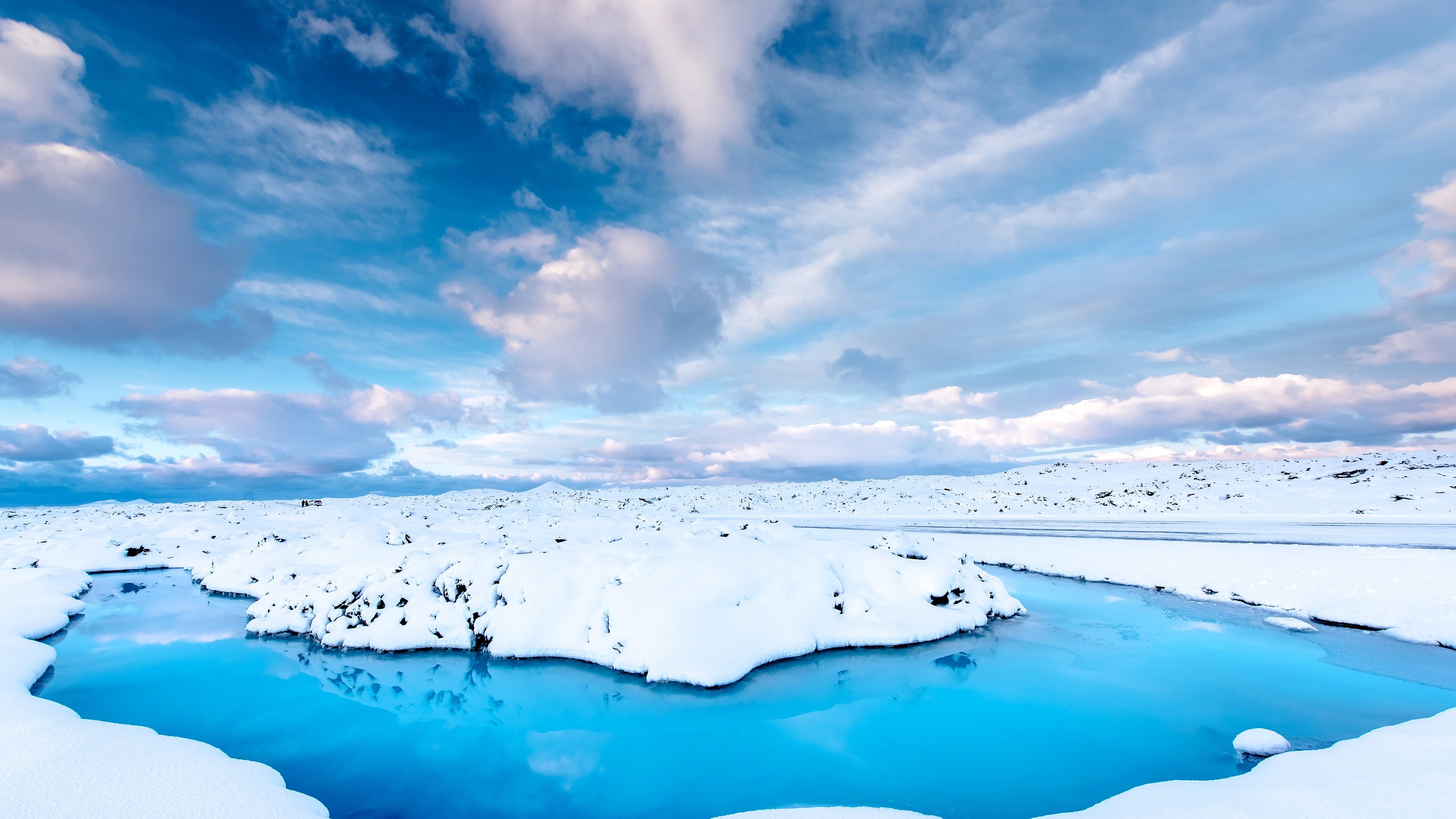 snow in water iceland clouds clear sky 4k 1540138428