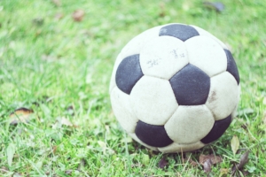 soccer ball football grass blur 4k 1540062194