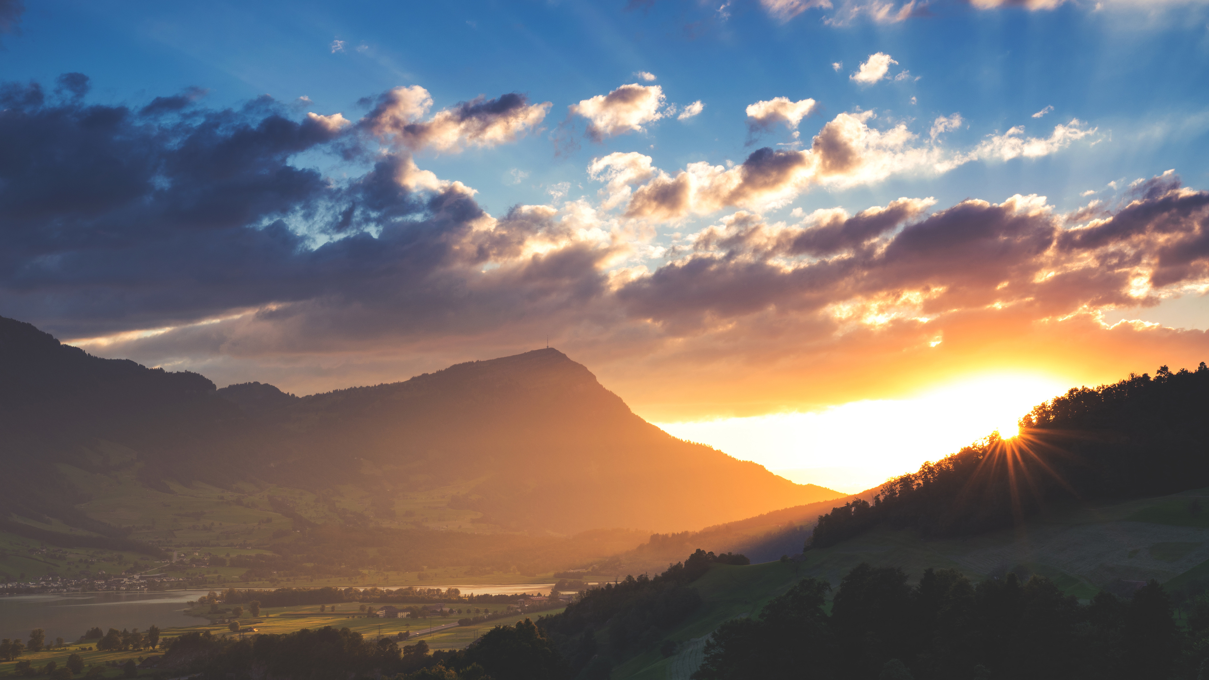 sunbeams mountains landscape 4k 1540136330