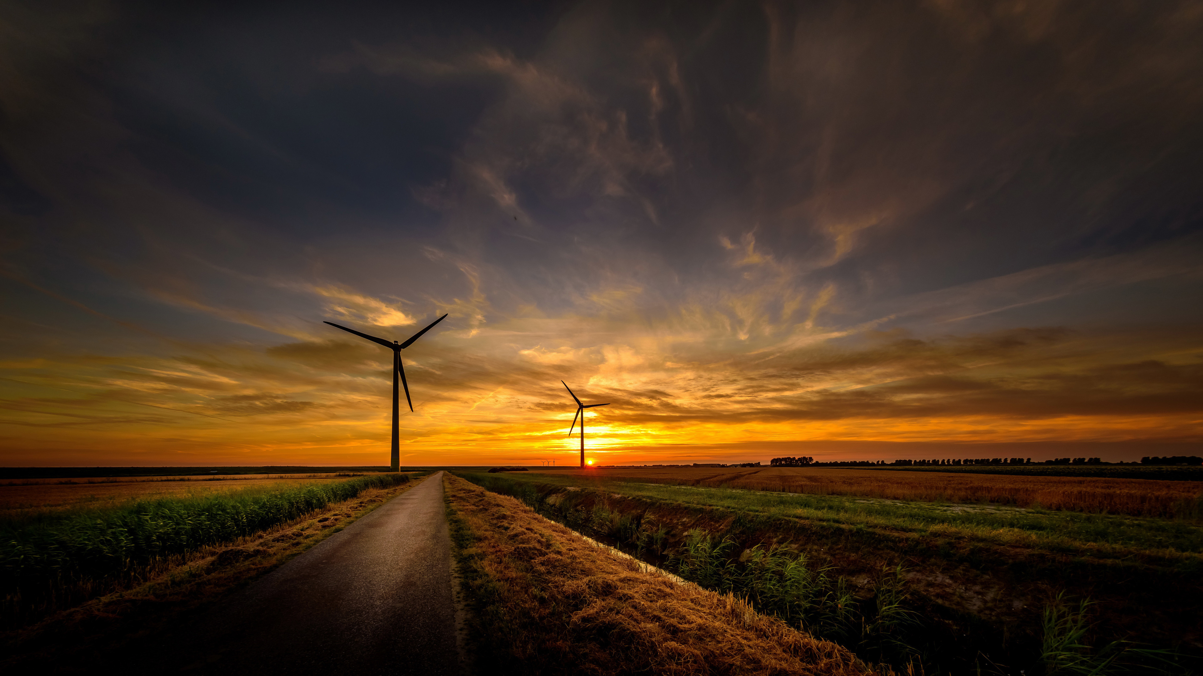 sunrise wind turbine road sky 4k 1540133797