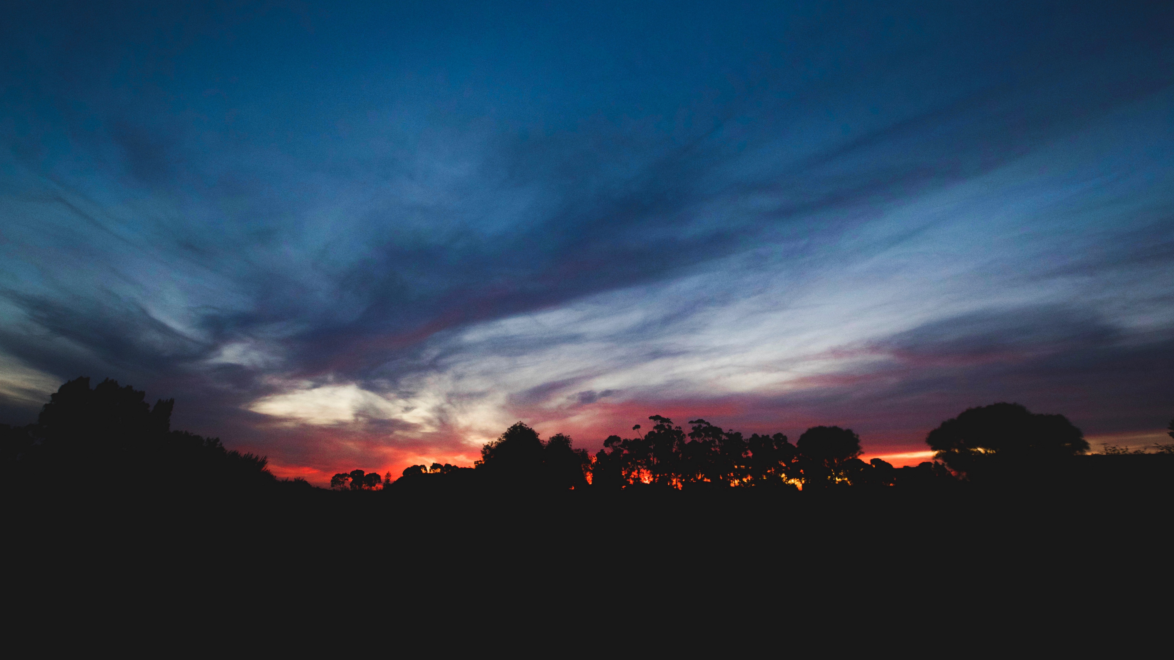 sunset trees sky clouds horizon 4k 1540576266