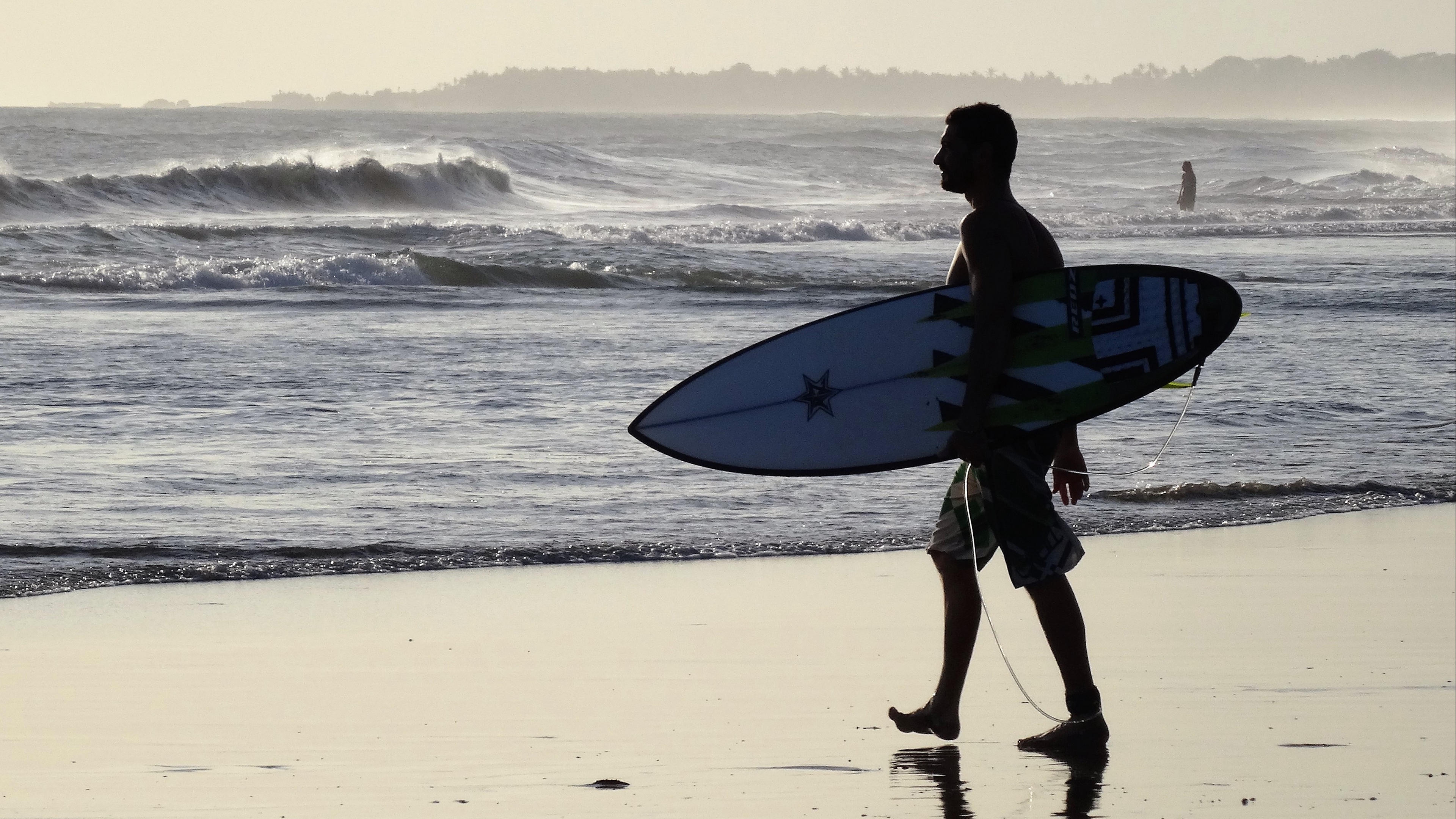 surfer bali beach surfing 4k 1540063205