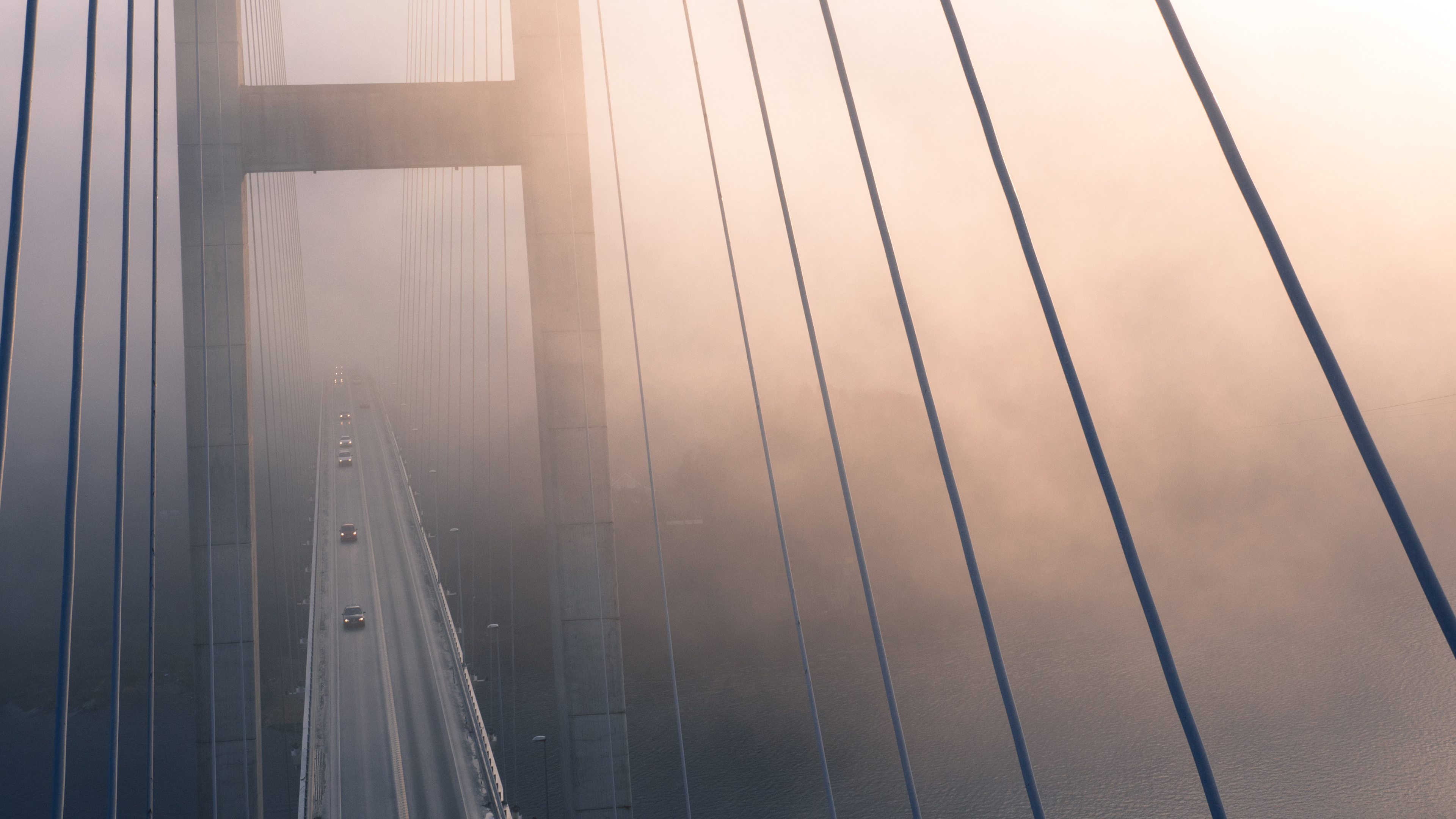 suspension bridge view from top evening fog 4k 1540136745