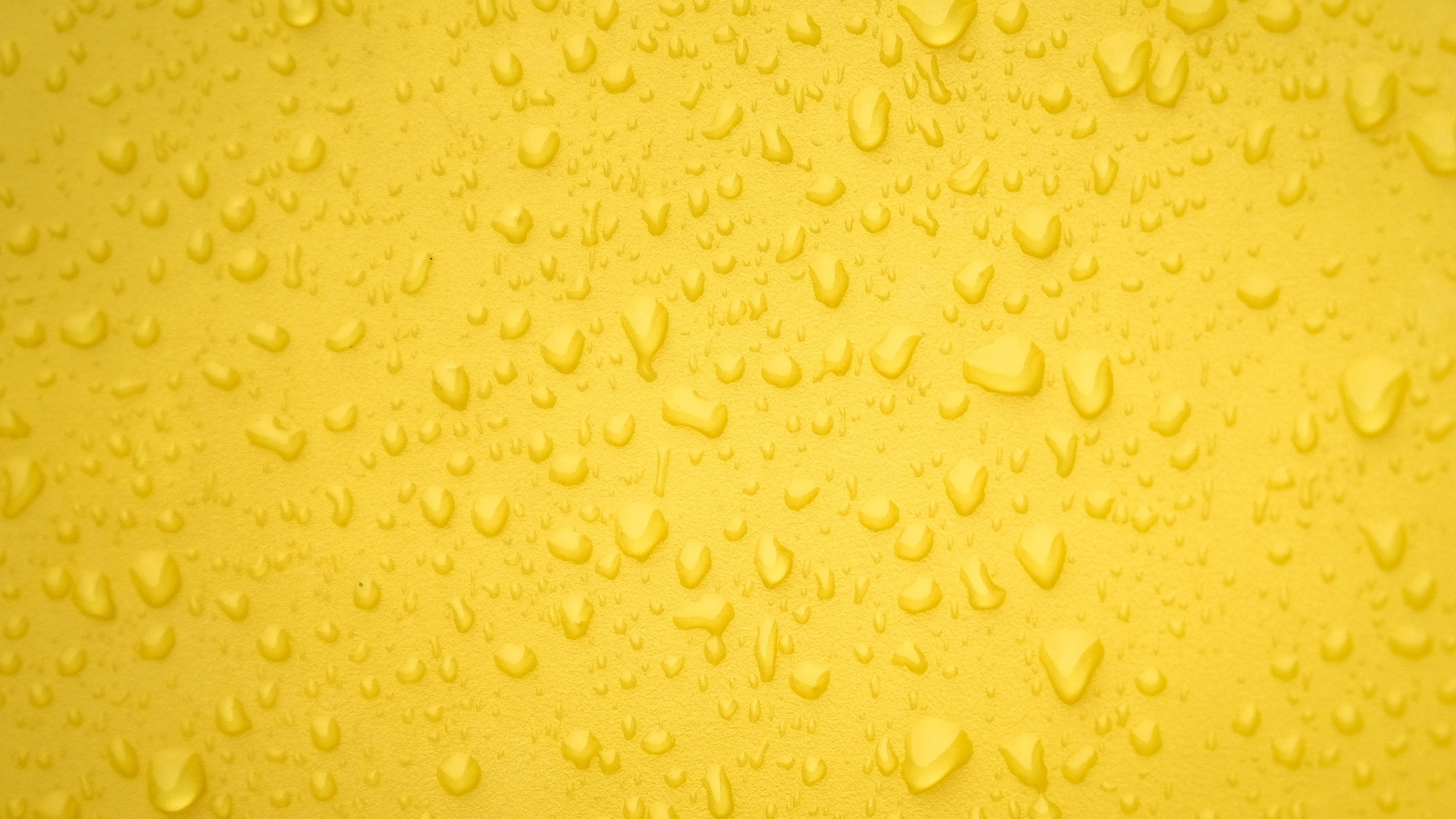 water drops yellow surface back 4k 1540134574