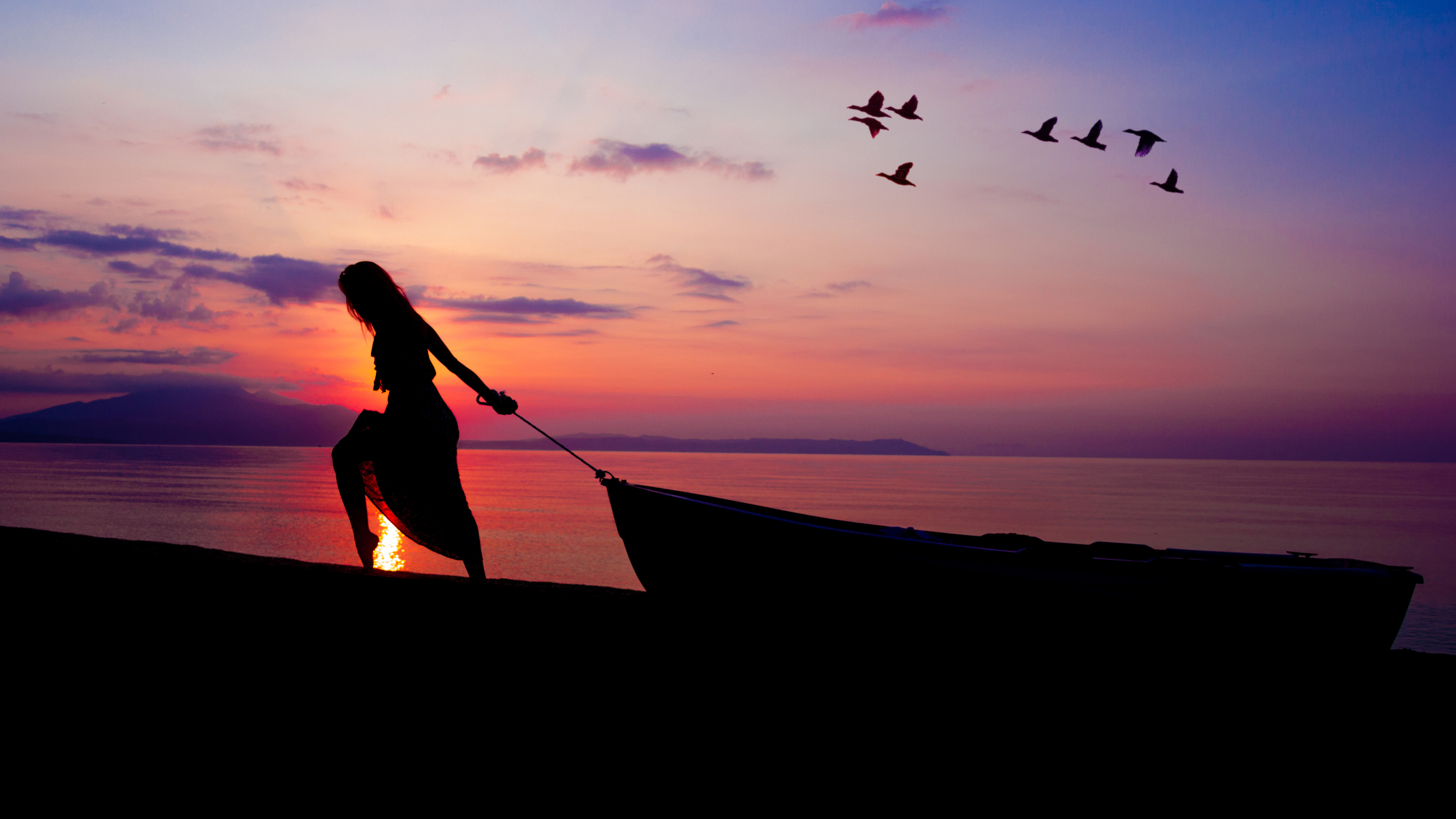 women towing boat beach sunset silhouette 4k 1540136240