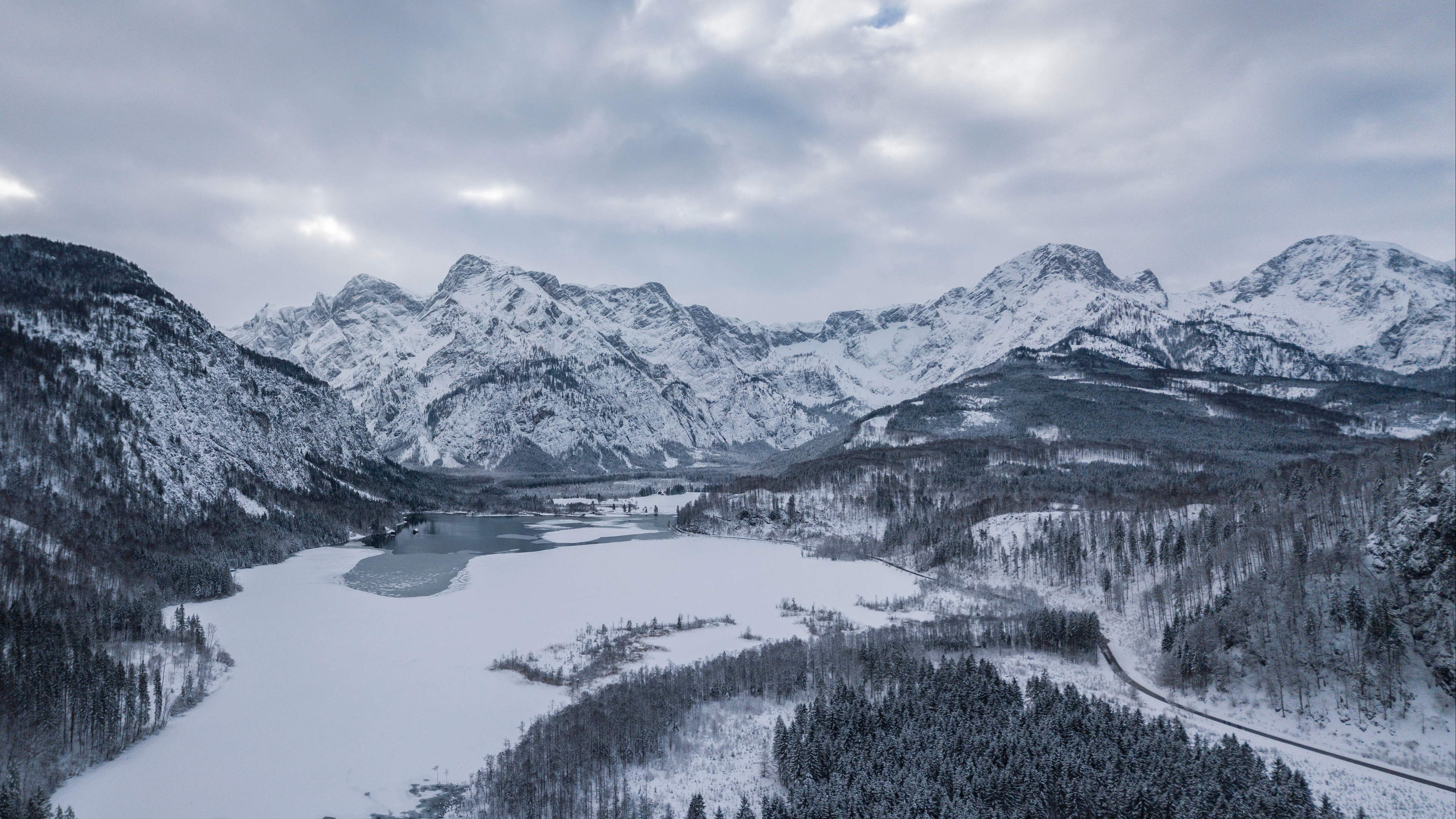 almsee austria mountains winter snow lake 4k 1541115081