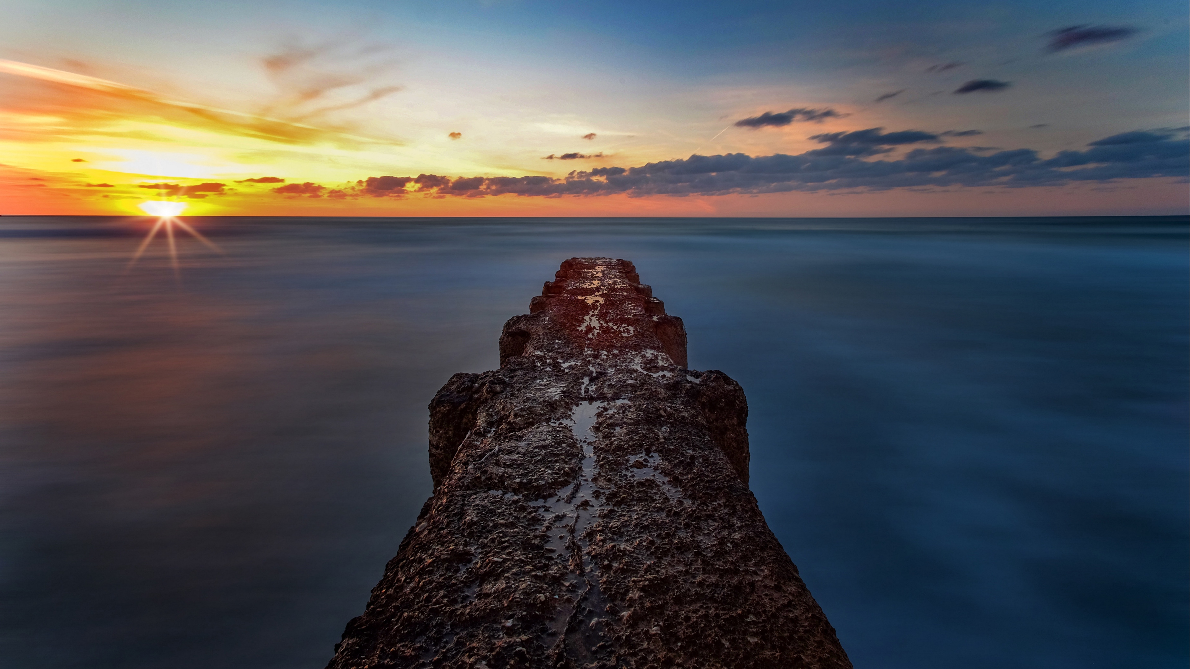 breakwater sea skyline sunset 4k 1541114269