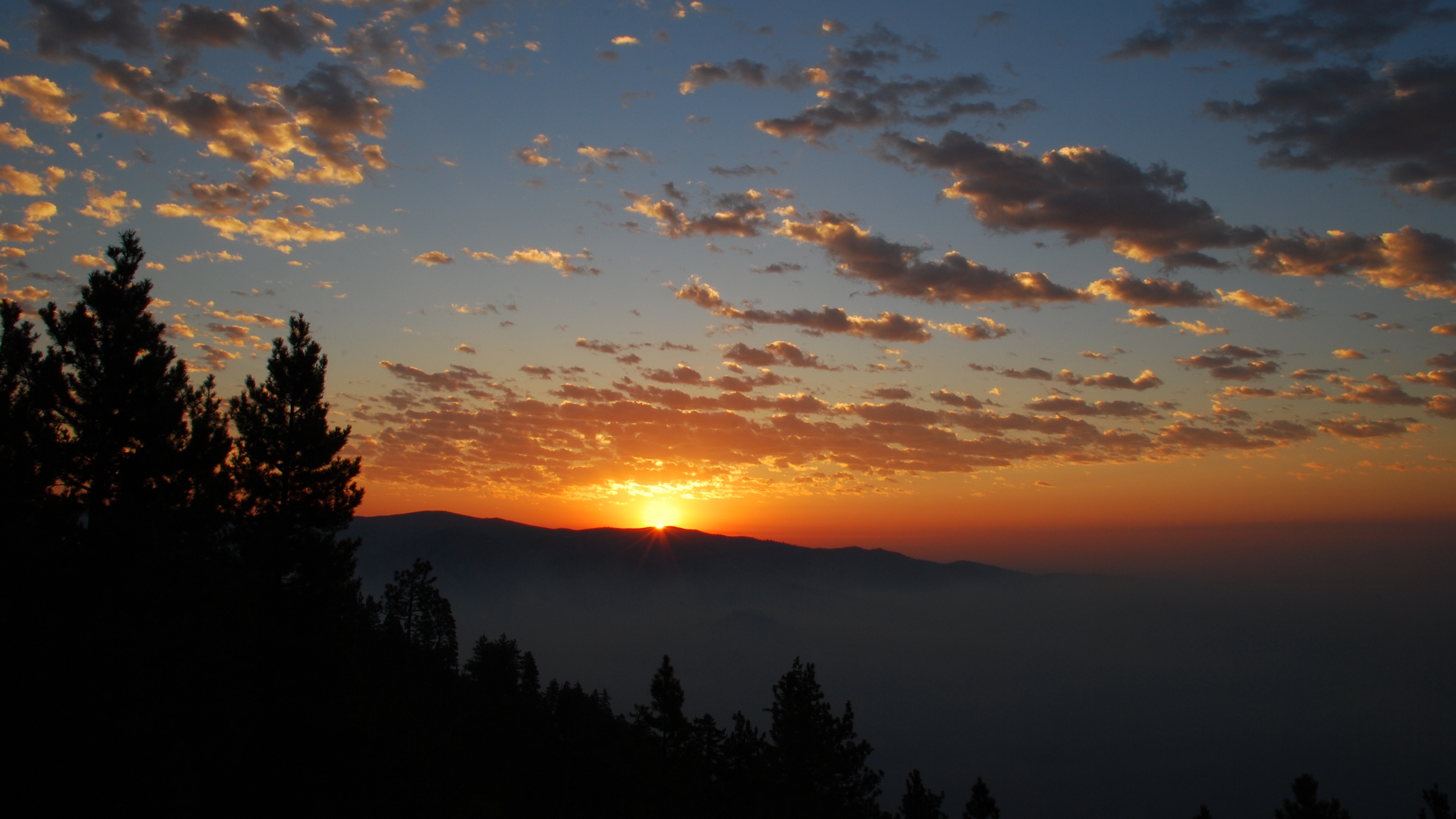 dawn mountains clouds sun 4k 1541117270