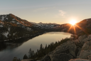 lake mountains sunset stones 4k 1541116449