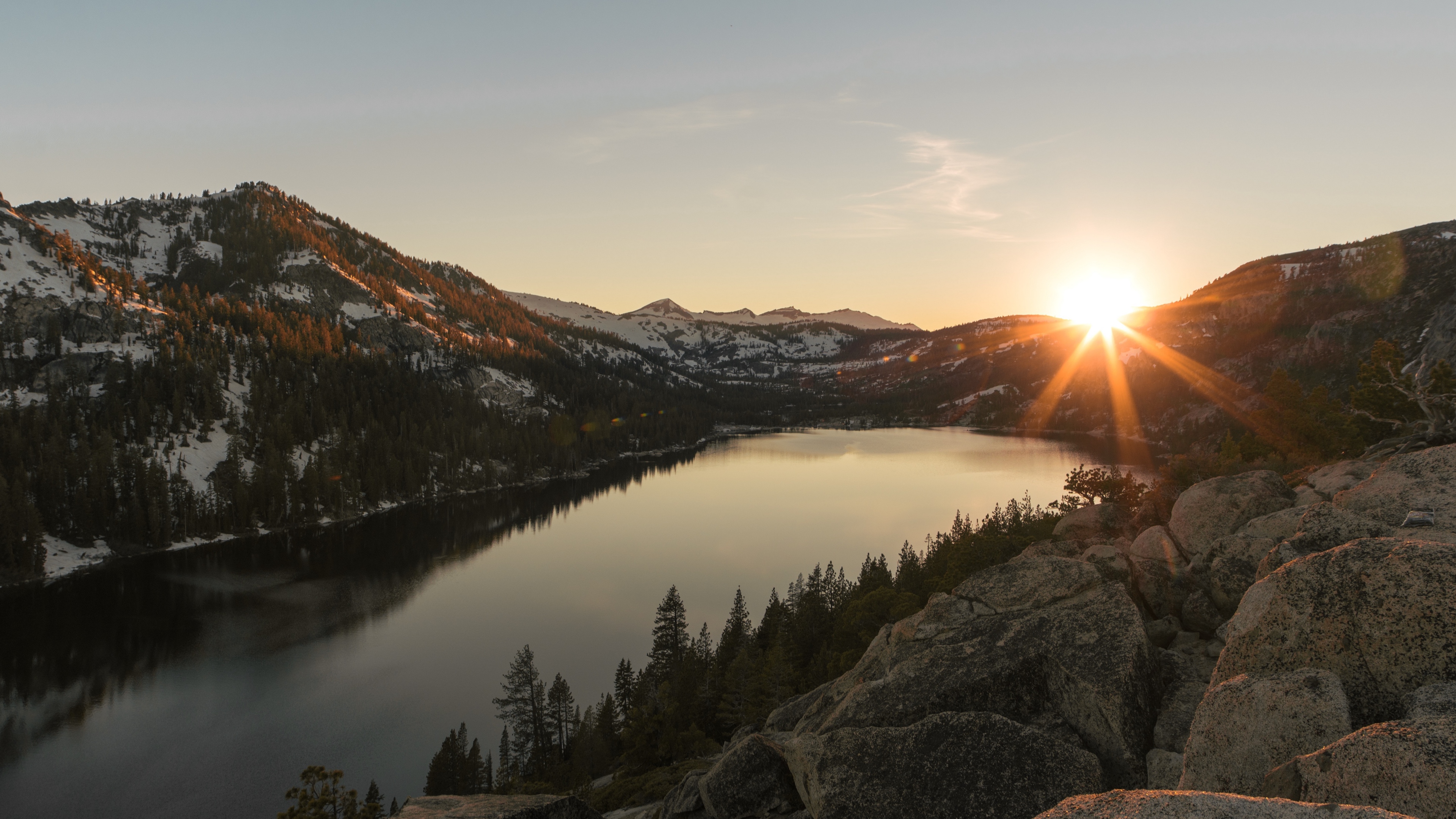 lake mountains sunset stones 4k 1541116449