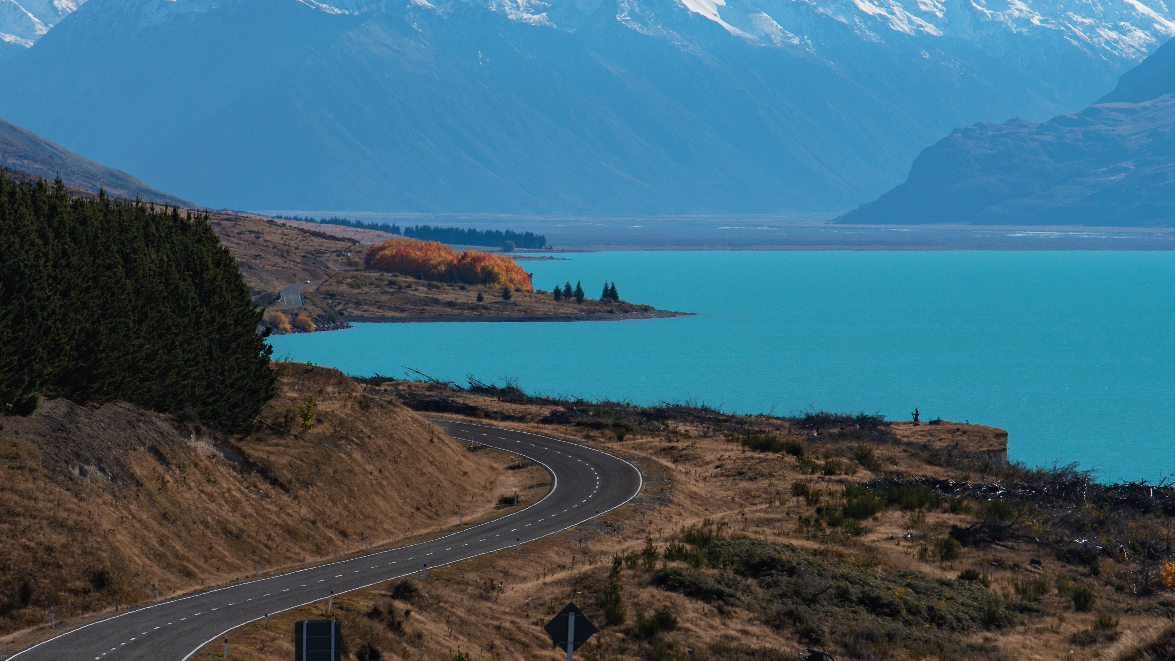 lake pukaki new zealand road mountains turn 4k 1541115259