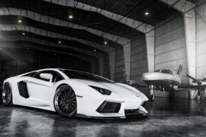 lamborghini aventador roadster in the plane hangar 1541968950