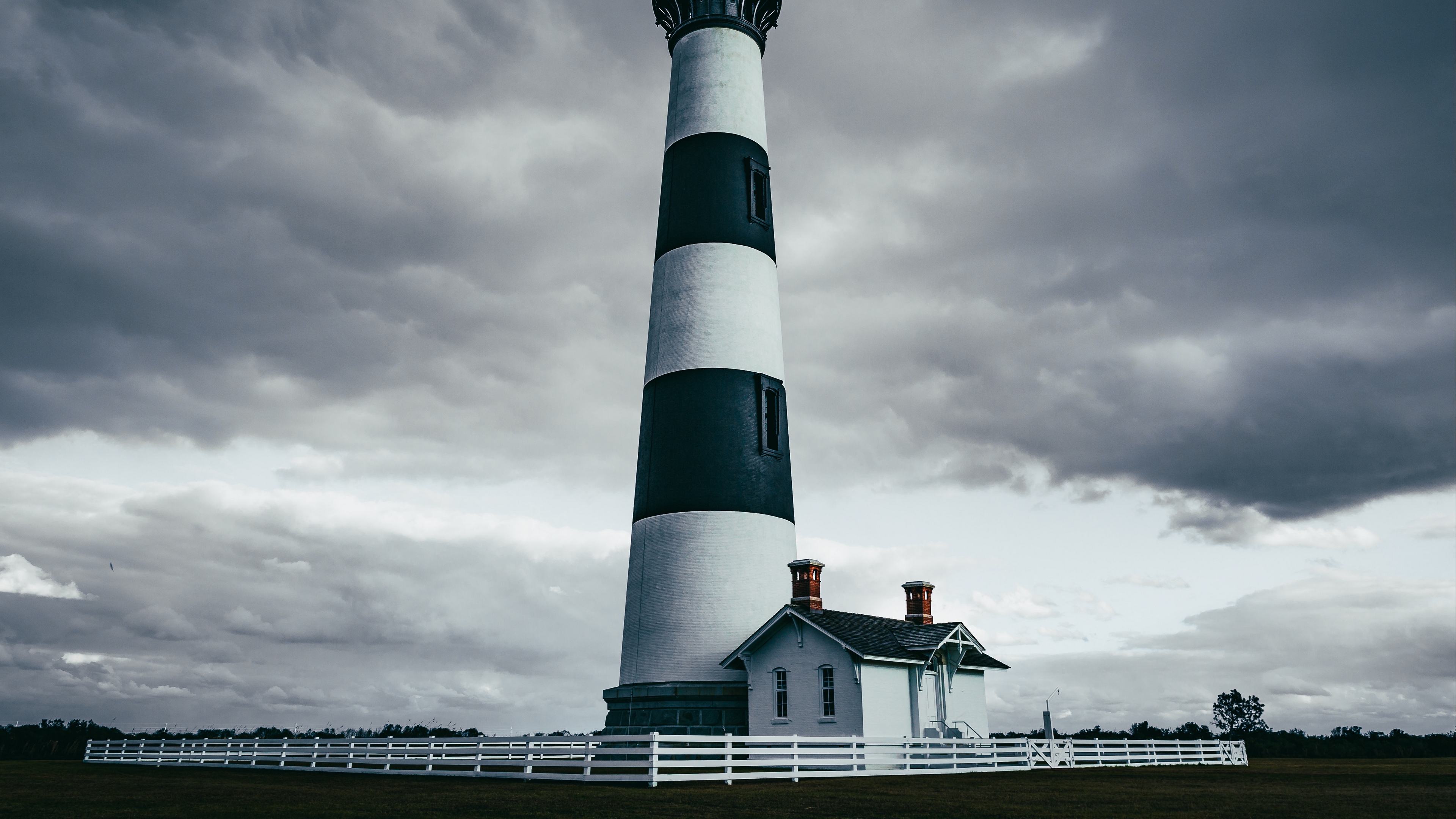 lighthouse building sky fence 4k 1541117458