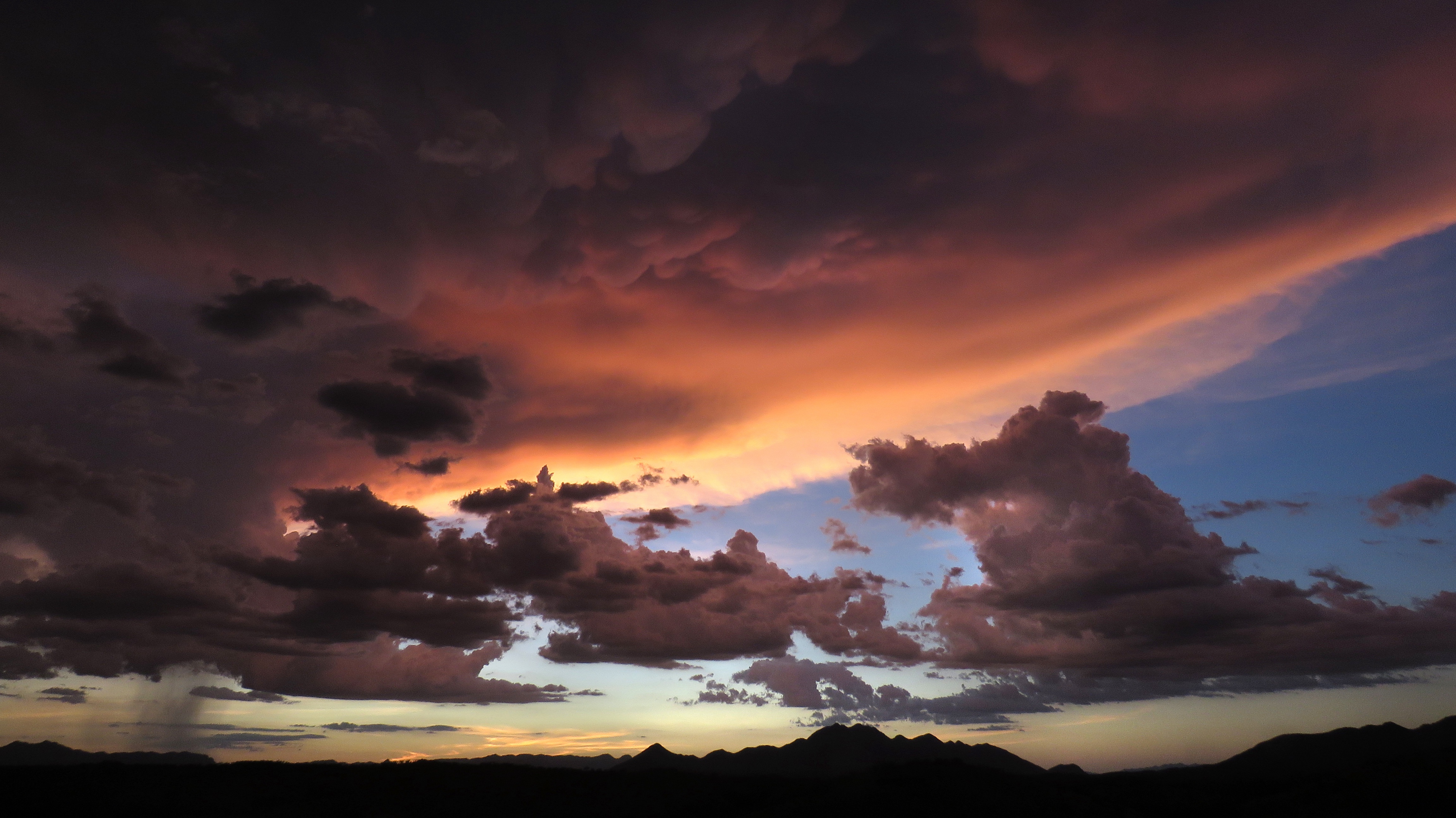 mountains clouds sunset sky cloudy 4k 1541113469