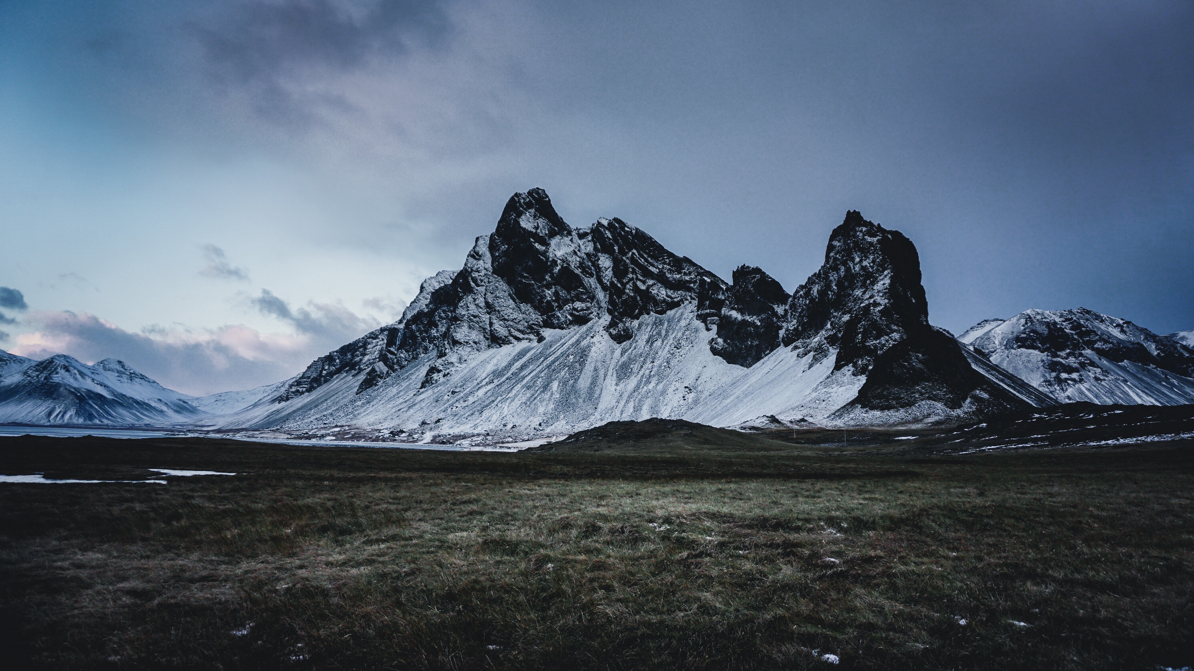 mountains grass snow evening 4k 1541114666