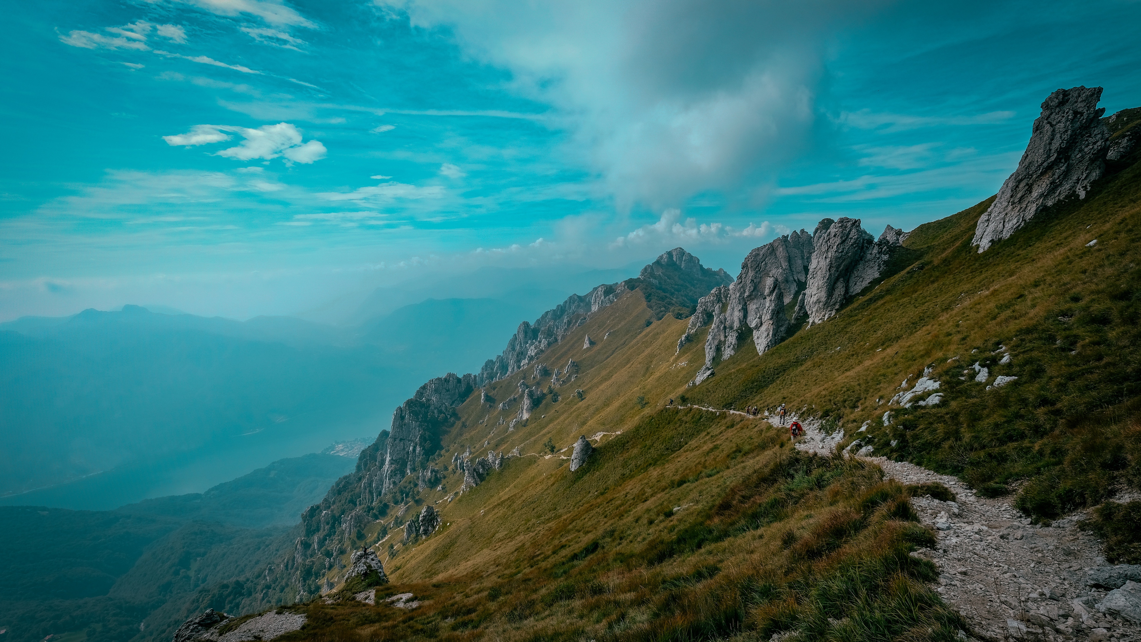 mountains path rocks stones top sky grass 4k 1541117323